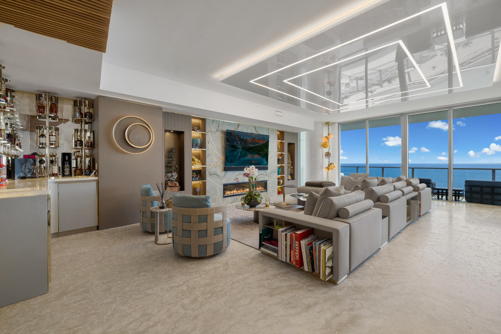 An oceanfront masterpiece at Auberge Beach Residences, this extraordinary combined residence was completely reimagined through a no-expense-spared renovation. Offered fully furnished turnkey (art excluded or negotiable) with Rugiano furnishings imported from Italy, the home showcases limestone floors extending onto every terrace, European white oak flooring, Venetian plaster walls, custom lighting, and designer finishes throughout. The Italian kitchen features Wolf/Sub-Zero appliances, marble countertops, a hidden coffee bar, and wine refrigeration. Entertain with an illuminated onyx bar, pebble ice maker, and antique glass accents. Complete with a private office, direct ocean views, private elevator foyers, four valet spaces, and world-class Auberge amenities,