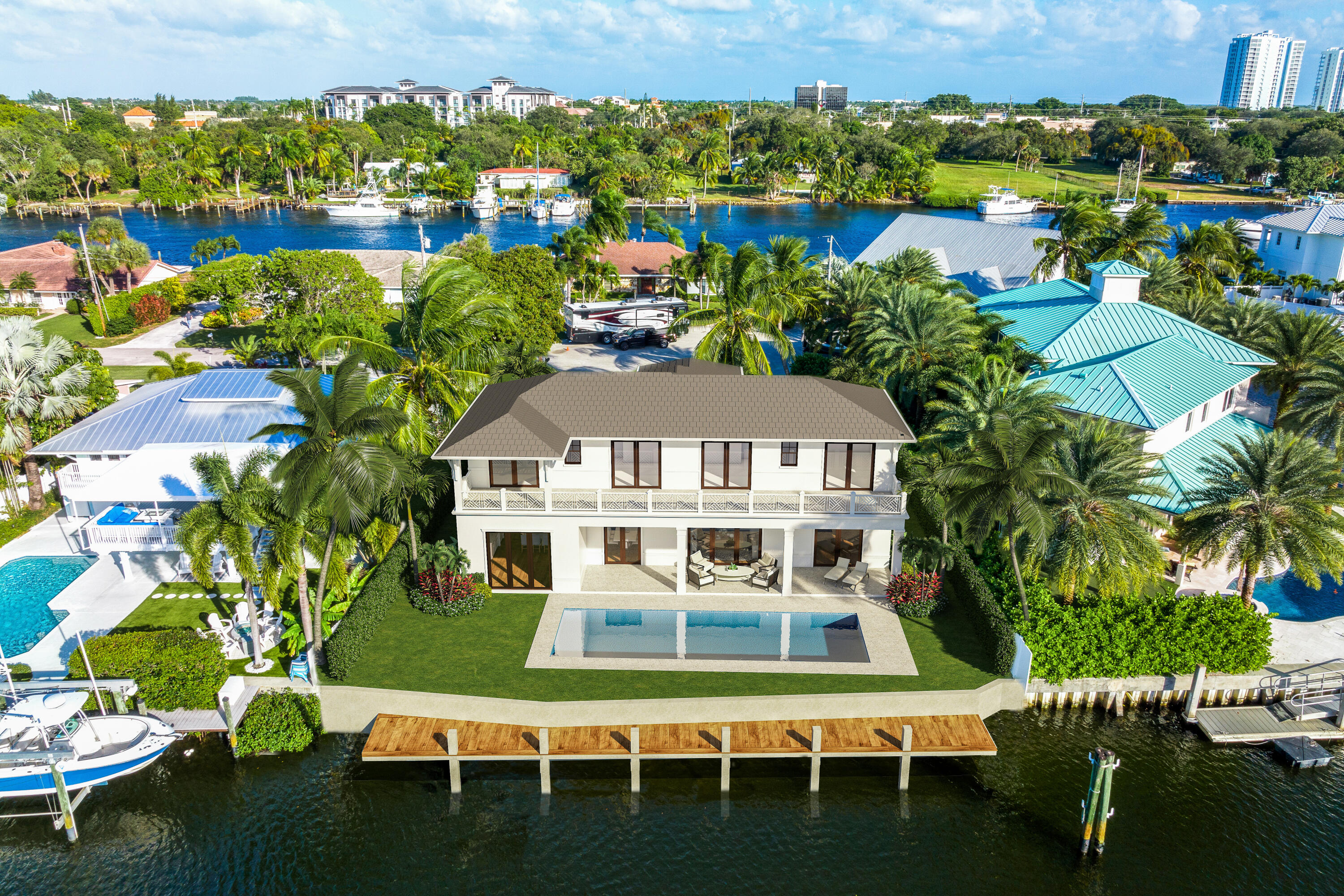 Waterfront New Construction Scheduled Completion Date December 2022. 5BR, one of which could serve as an Office, 5.1 BA, 2CG CBS home built with the finest and most Luxurious finishes (Floor Plans Attached).85' of water frontage on a deep wide water canal. 85' Trex dock with 15klb lift. Ocean access with no fixed bridges-only minutes to three waterfront restaurants. Abundant living space including great room, family room, formal dining room and dual master suites. 15' X 45'' heated pool/spa. A dream gourmet kitchen offers a Wolf 6 burner sealed Gas stainless steel cooktop, Wolf stainless steel 30'' built in double convection ovens, SubZero 48'' fridge/freezer.This is a Pre Construction Price-Property will be listed higher upon completion.See supplement... and dual Bosch dishwashers and a spacious pantry. The kitchen features hand-made custom cabinets with a large island. This home offers a grand entrance with double mahogany/glass style doors & marble floors and beautiful staircase opening to the great room. Several rooms feature beautiful ceiling details. The living areas on both floors are finished with high quality engineered wood floors. The home is being built with the best quality materials and workmanship including high impact hurricane windows and doors. There are large sliding doors in all the rooms facing the water letting in lots of natural light and giving a beautiful view of the pool, the water and your boat. The house is perfect for entertaining with a wonderful flow from the indoors to the outdoors.

The downstairs master suite includes oversized his & her closets, a spacious bathroom with a built-in dressing table, dual shower, soaking tub, and separate toilet rooms all finished in the highest quality marble and quartz. The upstairs boasts a spacious master suite with a large deck overlooking the pool and the water. Three additional upstairs bedrooms are all ensuites with luxury finishes and large walk-in closets also open out to the large deck. There is a day kitchen with sink and refrigerator in the gallery. Additional features include a large veranda with summer kitchen. This home is architect designed and has a West Indies flare with many contemporary features and includes new lush tropical landscaping.  The photos illustrated are virtually staged renderings along with photos of a prior project completed at 2389 Azure Cir Palm Beach Gardens Fl 33410.