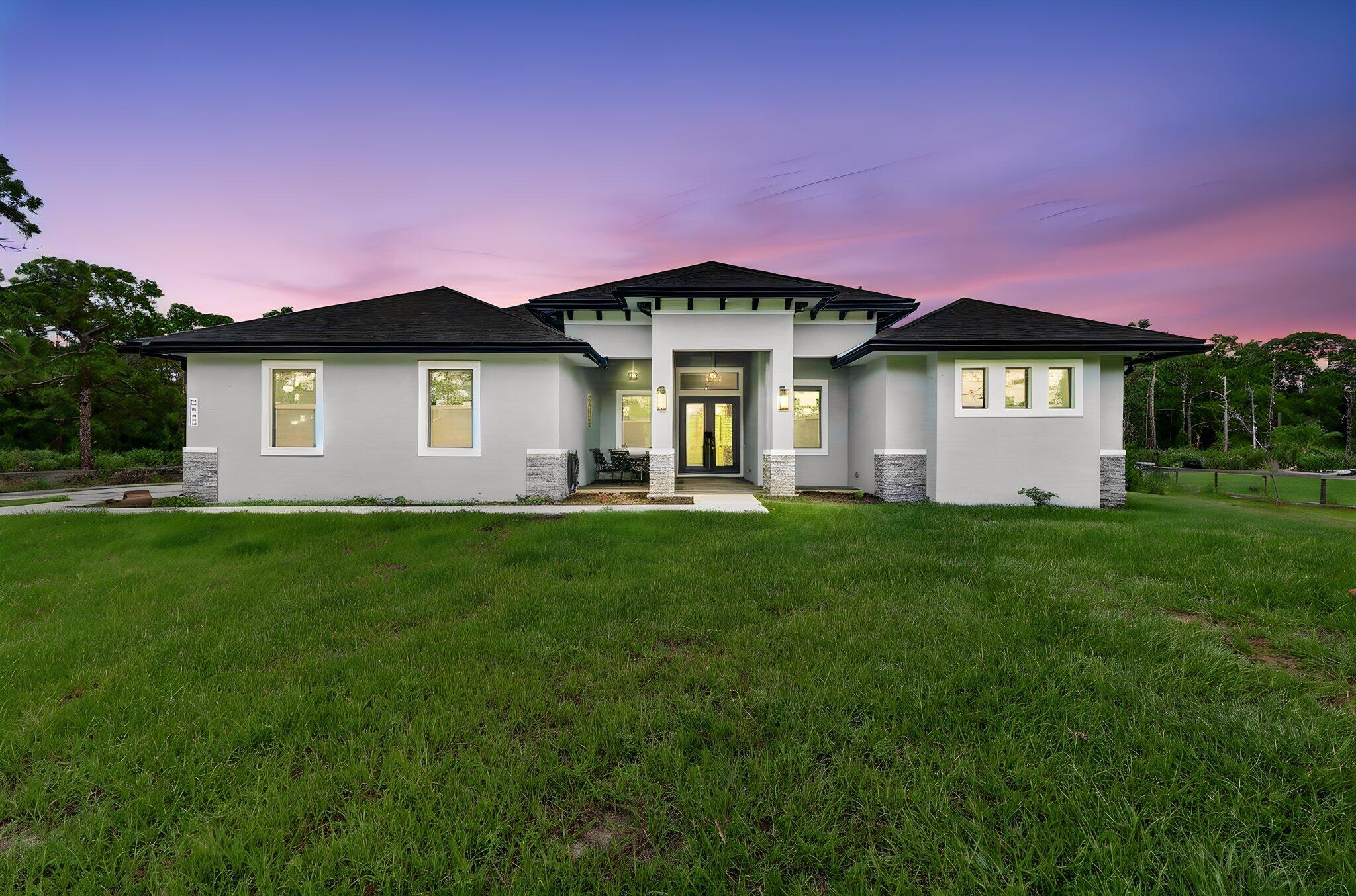 This beautiful 2 year old home has it all with a den, situated on 1.3 acre lot, can lighting in kitchen area, living area , and master bedroom. All bedrooms have 10 foot ceilings and 8 foot doors. Private gated driveway, coffer ceilings, the kitchen is spacious with a built in microwave, soft close drawers and cabinets and convection oven, home is an open floor plan,  beautiful master bath with dual vanities and gorgeous shower. All showers have rainfall shower heads All luxury plank flooring throughout and the best part, no HOA! Room for a pool, large patio and backyard for all your entertaining and toys IE boats, RV, ATV's or in law suite. Home has a generator 220 hookup and slab ready for your in home generator. This home has all you could want and more to make it your own.