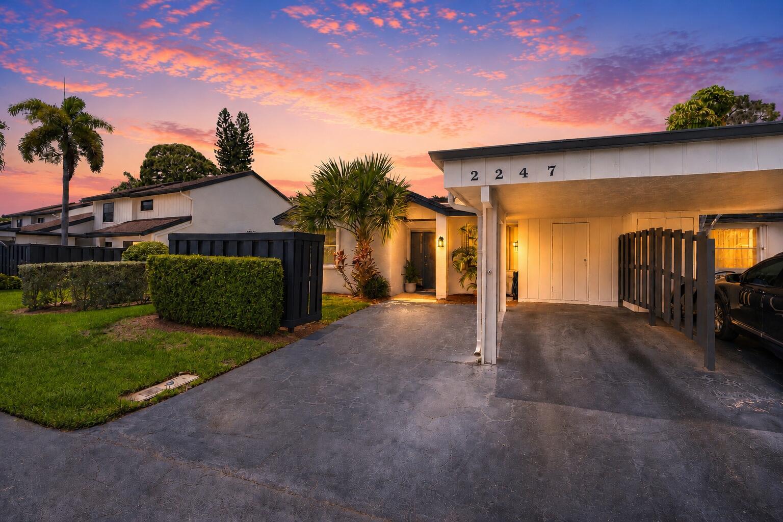 Welcome home to this spacious 3-bed, 2-bath corner Villa in a desirable Deer Creek Golf Course Community, a non-equity golf course community pay as you play with a LOW HOA and no mandatory membership fees.  Upon entering, you'll be captivated by the home's private tropical atrium, a tranquil retreat that that fills the home with natural light and creates a peaceful indoor-outdoor living experience. Vaulted ceilings and an open split-bedroom floor plan provide both comfort and privacy.  Designed for both comfort and functionality, the kitchen showcases stainless steel appliances, a breakfast nook, and picturesque views of the tropical atrium. A convenient pass-through opens to the dining and living areas, making entertaining effortless. The spacious primary suite is tucked away at the rear of the villa and offers a generous walk-in closet along with tranquil golf course views.   Step outside to the large covered and screened patio overlooking the 16th fairway, where you'll enjoy breathtaking sunsets, mature trees, singing birds, and the peaceful beauty of nature right from your backyard.  Enjoy all that Deer Creek has to offer, including an 18-hole public golf course, driving range, putting green, and the popular Deer Creek Grille, known for its breakfast buffets, happy hours, holiday events, and famous lobster specials.   Conveniently located next to Constitution Park which features a community center, playground, tennis/pickleball courts, an outdoor basketball court, and walking trails with beautiful tropical plants.   Just minutes from shopping, dining, major highways, and only 15 minutes from the beach.  Experience the perfect blend of golf course living, natural beauty, and everyday convenience. Schedule your private showing today!