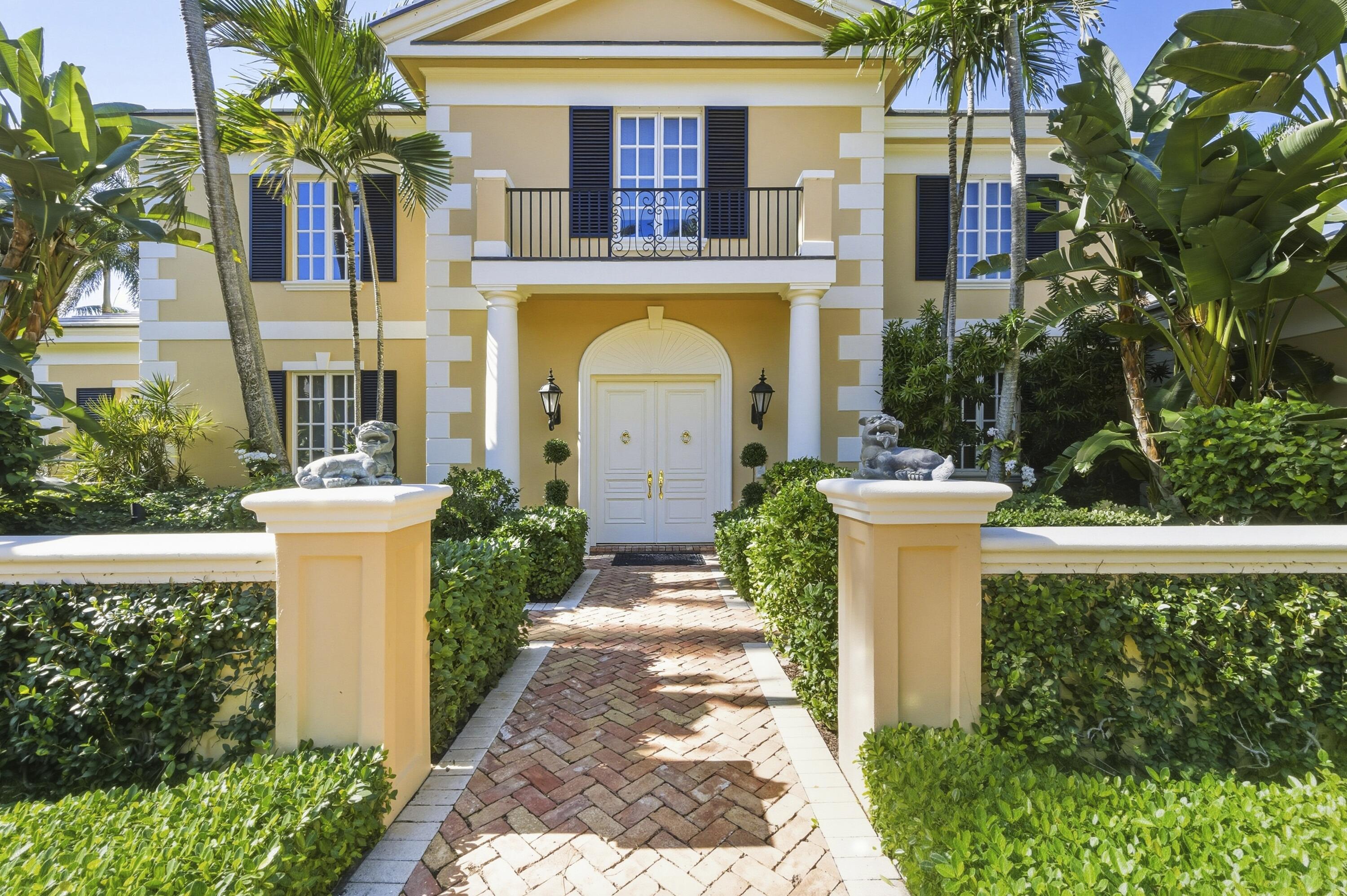 Beautiful Intra-Coastal property (3/4 acre) with deeded ocean front lot with possibility of adding an oceanfront cabana. Beautiful classic elements in this 4 Br/ 4.5 bath home with dock, lap pool and gorgeous wide water views.  11' ceilings, hardwood mahogany flooring.  Four garage parking.  Detached  double garage with apt. above with LR, full KIT, 1 Br/1Ba, balcony overlooking serene lush gardens.