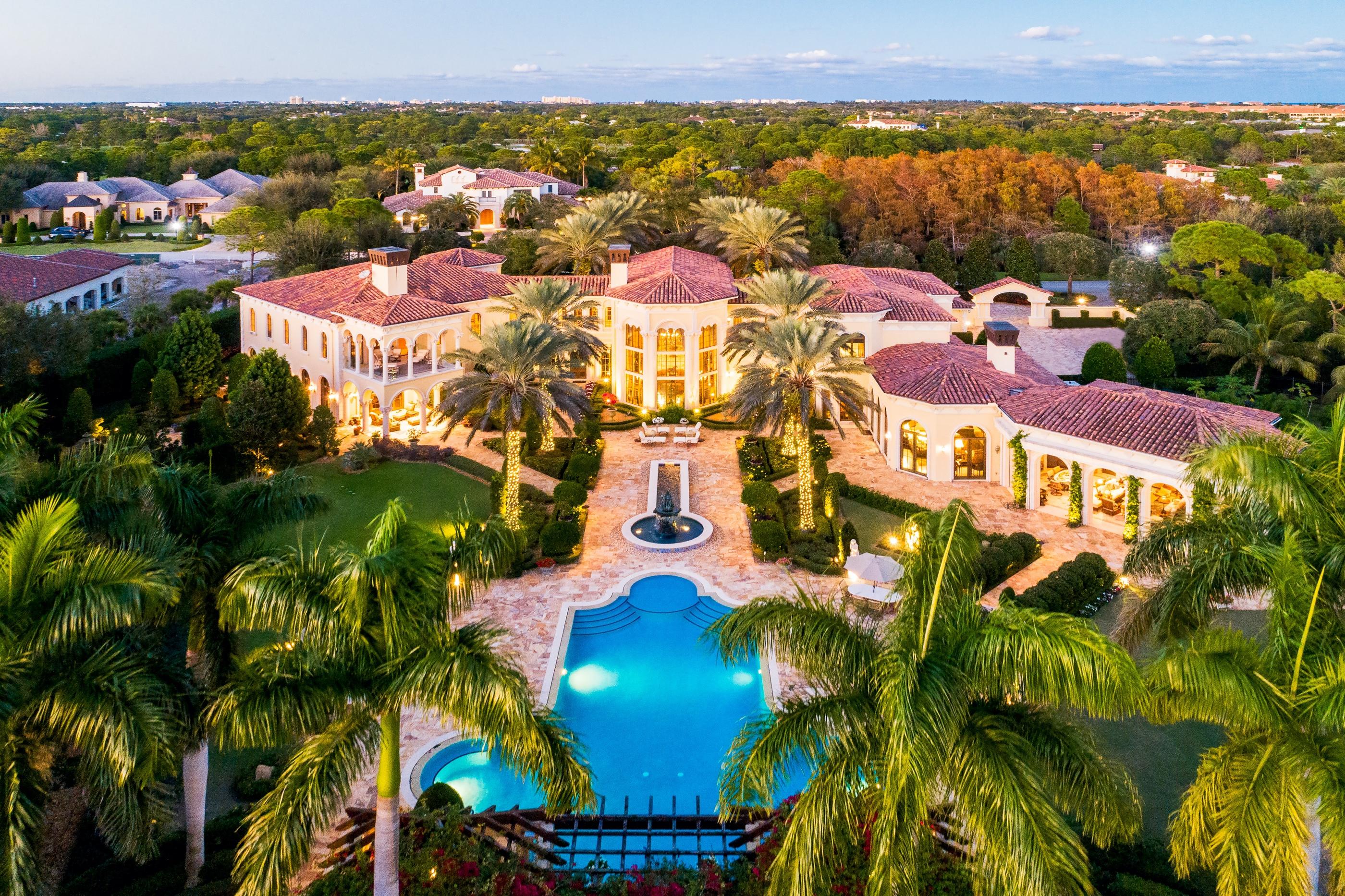 Introducing private legacy estate ''The Venetian Palazzo'' located in the Prestigious Bears Club. A truly extraordinary ''tech savvy estate'' situated on a private 2-acre lot surrounded by preserve land offering nearly 17,000 in luxurious living space. The unique designs, finishes, & fixtures throughout the estate were the result of extensive research of actual Italian Palazzos & Villas in Florence. From intricate millwork, European hand-painted ceilings, museum designed sculpture gardens, 60,000 gallon edgeless free-form swimming pool, 20 different types of hand-cut marble from 12 different countries in this inception. This timeless & unequaled estate is meant for a truly discerning buyer looking for something that cannot be duplicated. This is without a doubt one for the ages.