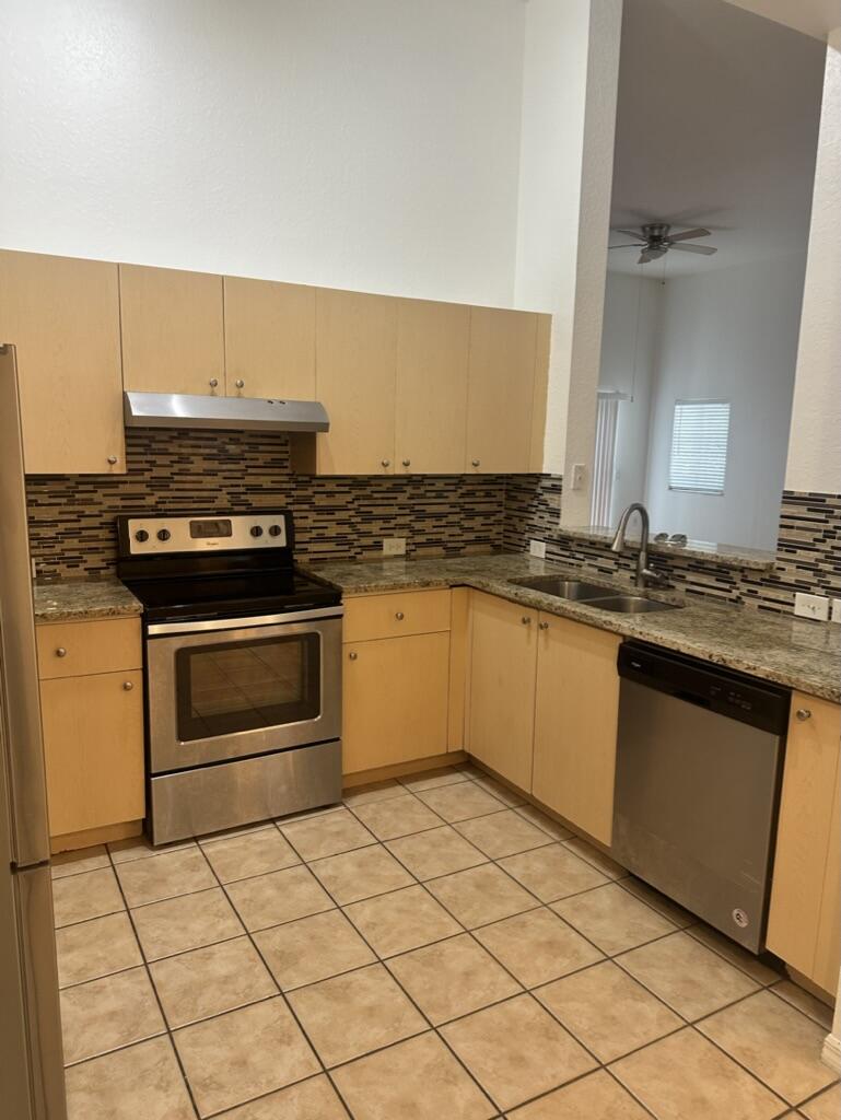 KENSINGTON OF ROYAL PALM BEACH CONDOI - Residential Lease