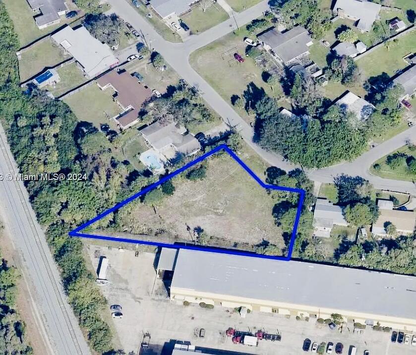 CLOSE TO 1 ACRE!.  and  CLEARED RECENTLY .78-acre property offers many opportunities for investors or for building.  With access to both city water, city sewer, and a well,. Situated near US1 and the INTERCOASTAL This is brilliant for fishing and boating enthusiasts. The open and very wide lot is ideal for constructing a workshop or an oversized garage, perfect for storing boats, RVs, jet skis, or campers. Additionally, the newly approved Palm Bay zoning permits Accessory Dwelling Units (ADUs), opening doors for the construction of a separate, fully functional guest or in-law house. This presents exciting possibilities for short or long-term rental income.