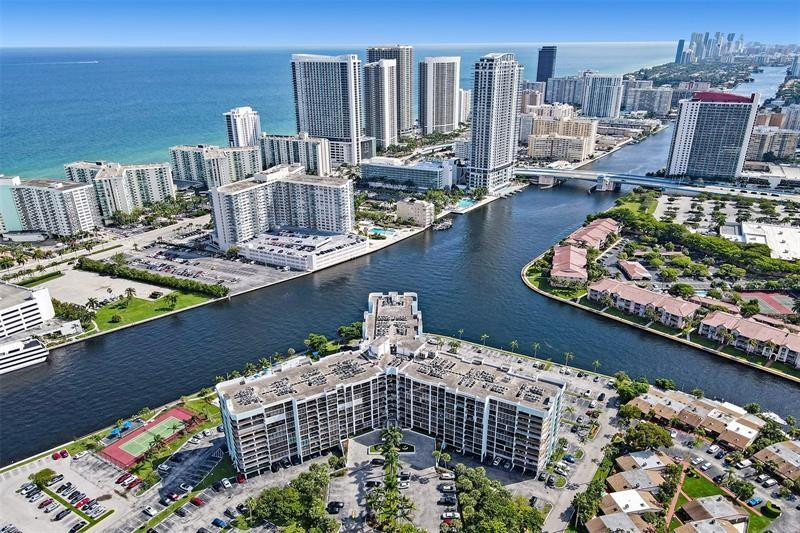 Offering 915 sq.ft. of open-concept living with floor-to-ceiling windows and beautiful Intracoastal views.  Includes assigned parking with annual lease. Enjoy resort-style amenities: waterfront pool on the Intracoastal, tennis courts, gym, community BBQ, and more. Located on Three Islands, just minutes from the beach, shopping, dining, and all that Hallandale Beach has to offer.   Unit also for rent MLS: B26021473
