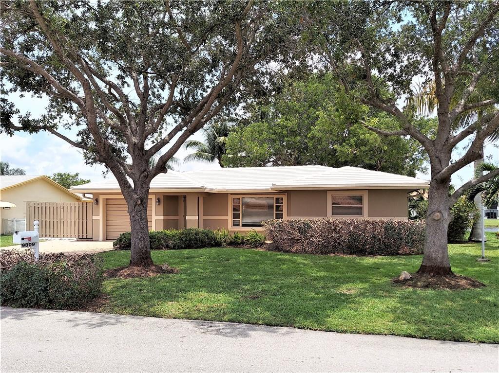 Absolutely beautiful spacious residence with impeccable upgrades. Completely remodeled. Freshly painted in and out. Nice layout with open living areas. Custom tile floors throughout living area. Eat in kitchen has custom cabinets, granite and stainless-steel appliances. Remodeled baths. Custom crown molding and baseboards. Spacious Florida Room with amazing water views, great for entertaining. Side yard is gated for a trailer or your recreational toys. Walk to pool and clubhouse. Great schools nearby. Well maintained community with a heated pool for year-round enjoyment. Great location near golf courses, schools, major roads, shopping and restaurants. Twenty-five-minute drive to the beach. Five minutes to Sawgrass Exwy.Irrigation system does not convey.Cash or conventional only.