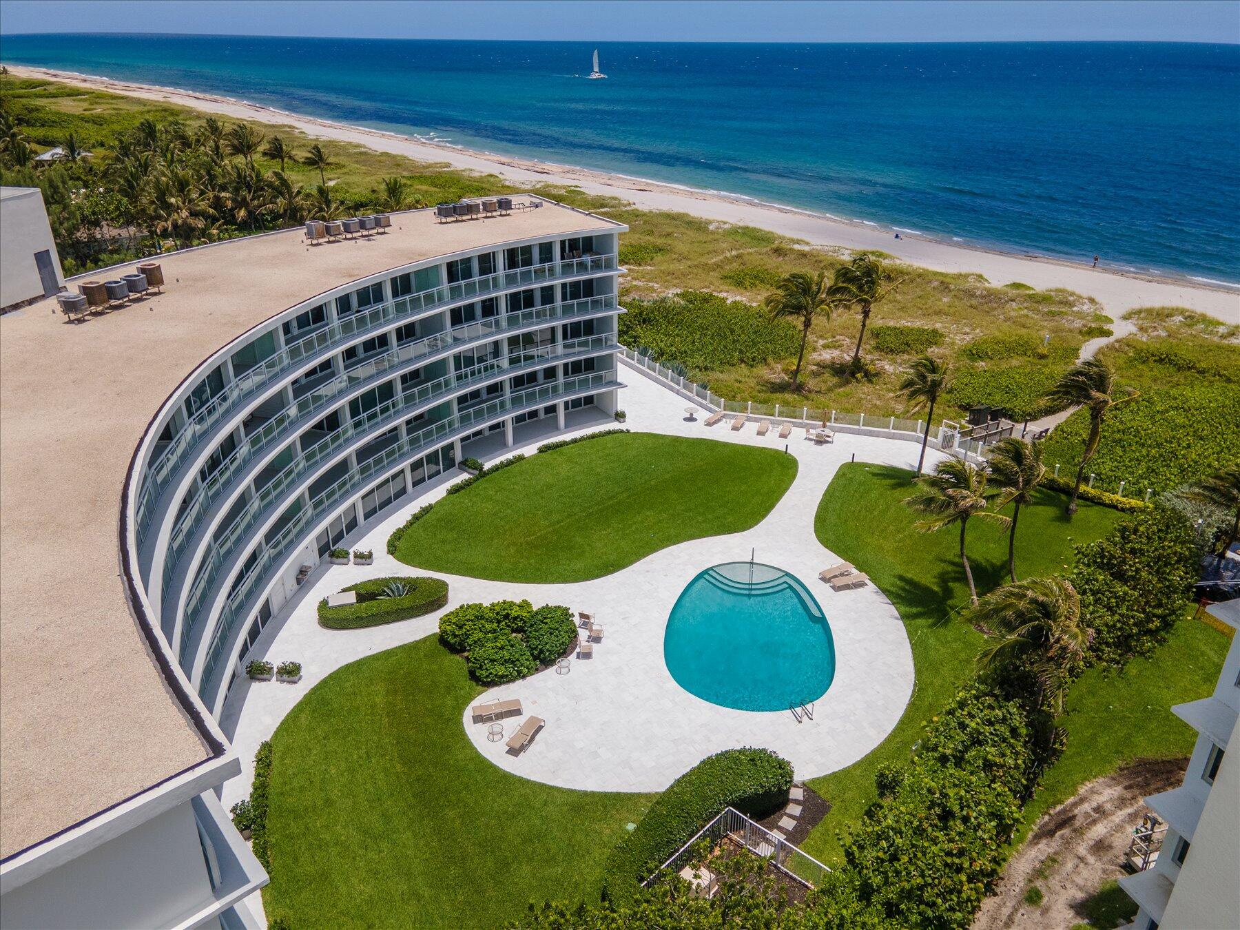 ENJOY the ultimate beachfront lifestyle!!  While living in this oceanfront condo with direct ocean and pool views from your spacious covered balcony.  The building, grounds and the condo are most recently renovated with top of line appliances and full impact glass.  There is a washer and dryer in the unit. This is a boutique building with 24 condos, a private beach and plenty of parking.  Quiet oasis that is minutes from restaurants, shopping and more. 90 day minimum rental