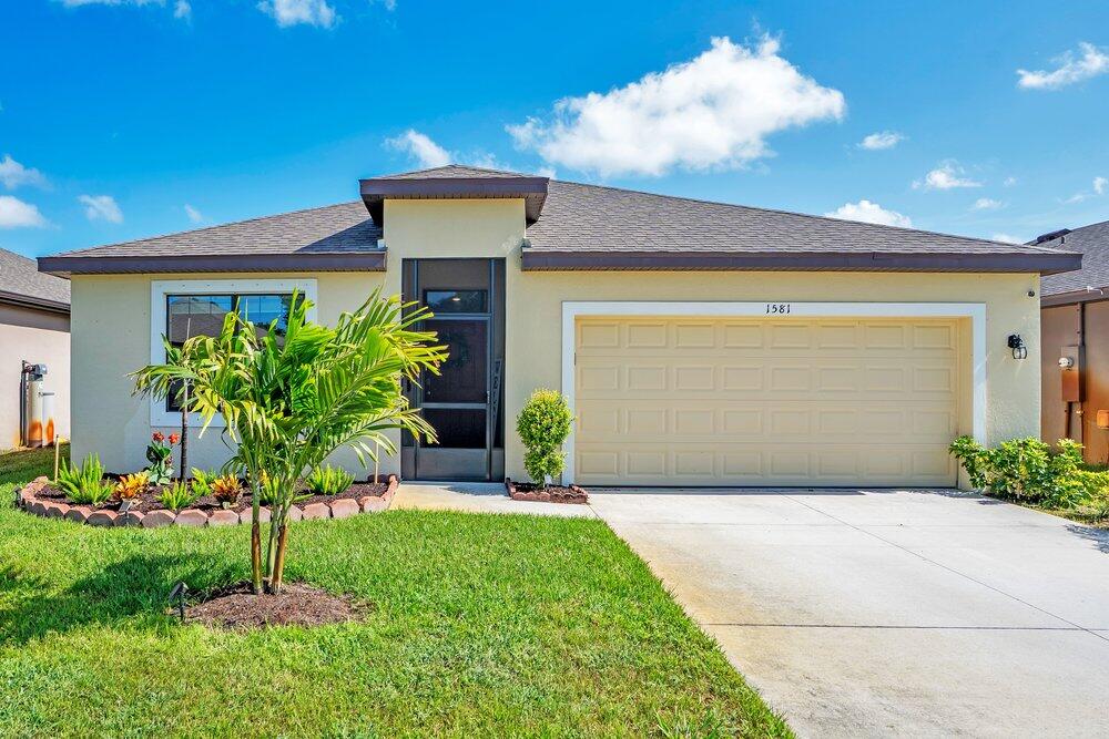 Welcome to this beautifully maintained 4-bedroom, 2-bath in a gated community. The home built in 2023, where modern design meets comfortable Florida living. Thoughtfully designed with an open-concept layout, this residence features tile flooring throughout the main living areas and plush carpeting in the bedrooms for added warmth and comfort. The spacious kitchen flows seamlessly into the living and dining areas, creating the perfect space for both everyday living and entertaining guests. The private primary suite offers a spacious walk-in closet and a well-appointed bath retreat. A screened front entry adds both charm and functionality, while the covered, screened-in rear patio provides the perfect setting to enjoy peaceful pond views and Florida's year-round outdoor lifestyle.  With newer construction, functional living spaces, and serene water views, this move-in ready home offers the perfect blend of style, comfort, and convenience.