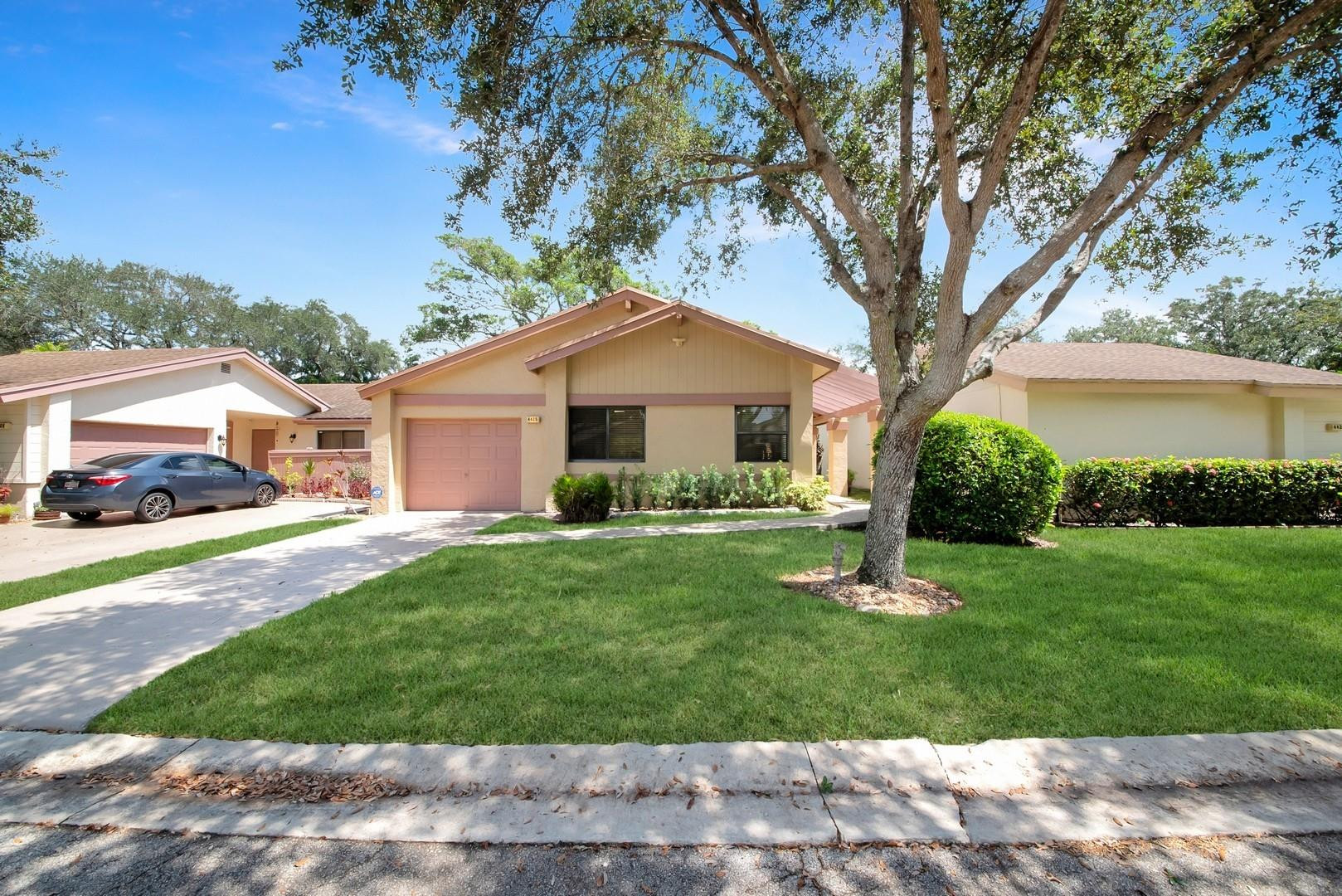 Nothing left to do here except move into this 2-bedroom, 2-full bath, 1 car garage home located in desirable Sawgrass Village I at The Township, a 55+ community in the heart of Coconut Creek. Meticulously remodeled with exceptional attention to detail and function throughout: with a newer roof, A/C, impact windows and doors for security and comfort, owned solar panels for low energy costs, updated water-resistant flooring, upgraded remodeled kitchen, and updated renovated bathrooms, and outstanding adjustable lighting throughout. Embrace the beautiful South Florida lifestyle on the screened-in patio, or at the Township's outstanding amenities. The community is easily walkable; access to Tradewinds Park and shopping are within an easy walk or bike ride. Just move in and enjoy, call today!! There is nothing left to do except move into this 2 bedroom, 2 full bath, 1-car garage home  located in desirable Sawgrass Village I at The Township, a 55+ community in the heart of Coconut Creek. Meticulously remodeled with exceptional attention to detail and function throughout: with a newer roof, A/C, impact windows and doors for security and comfort, owned solar panels for low energy costs, updated water resistant flooring, upgraded remodeled kitchen, and updated renovated bathrooms, and outstanding lighting throughout, fully adjustable to suit the mood. Embrace the beautiful South Florida life-style year round on the screened-in patio, or at the Township's outstanding amenities. Leave the car in the garage. The community is easily walkable, access to Tradewinds Park as well as shopping are within an easy walk or bike ride. Add to your peace of mind with some of the lowest maintenance fees in The Township. Just move in and enjoy, everything has already been done! This IS the one you have been searching for. Call today to schedule your private showing!!