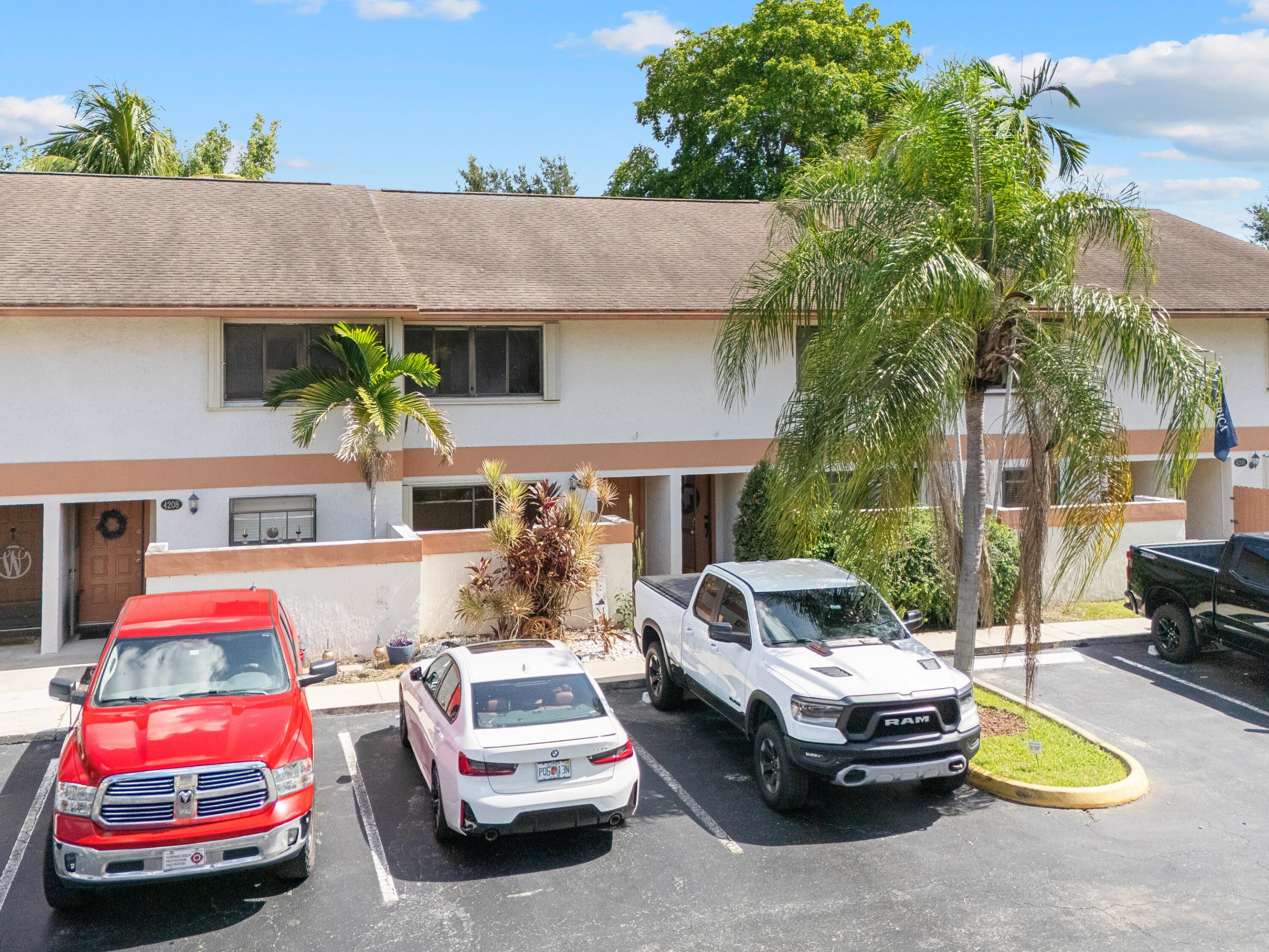 Welcome to this beautifully updated townhome in the heart of Davie! Featuring vaulted ceilings, an open concept layout, and abundant natural light, this home offers a spacious and inviting feel. The updated kitchen boasts white shaker cabinets, granite countertops, stainless steel appliances, and a breakfast bar overlooking the living area. Enjoy the screened in patio with no rear neighbors, providing extra privacy and peaceful tropical views. Updated bathrooms, ample storage, and a move in ready interior complete the home. The association is also scheduled to install a brand new roof and repaint the exterior, adding even more value and curb appeal.  Amenities include a pool, tennis courts, and a playground. Conveniently located near NSU, Broward College, FLL airport, dining, and shopping.