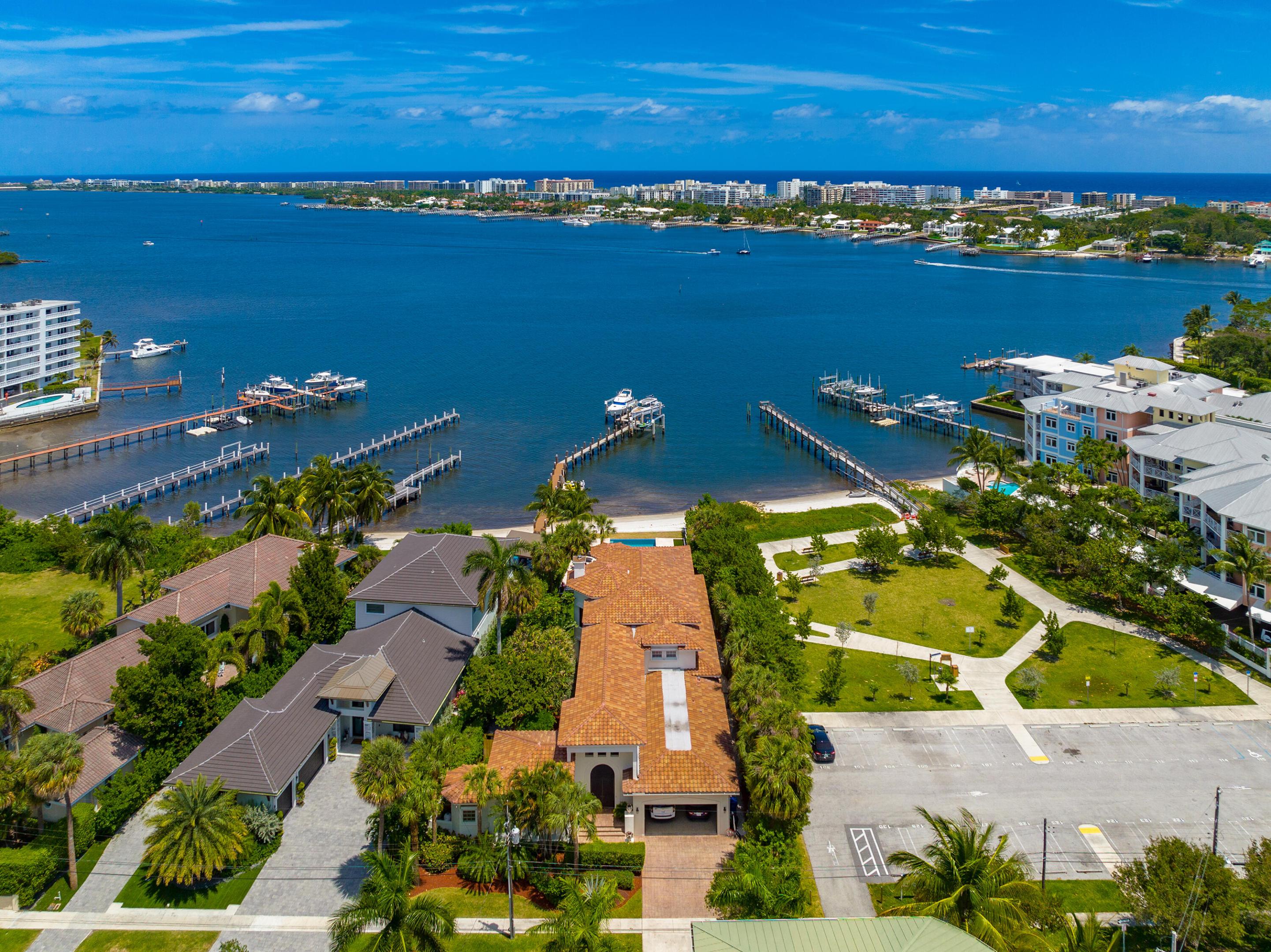 Welcome to paradise! Gorgeous views of the Intracoastal Waterway and short distance from Boynton Beach inlet. This home features four bedrooms in the main house and a guest cottage with private entrance and kitchen.  New heated infinity edge pool, updated kitchen and bathrooms in 2019, new roof also in 2019. Soaring ceilings, 24,000 lb boat lift, 40-kw generator, 30 foot ceilings, LED lighting, marble flooring, quartz countertops and viking appliances in the kitchen.  Walking distance to Old Key lime house, 3 blocks from the beach AND your own private white sandy beach! Panoramic views from enlarged master suite, huge closets, soak in your tub looking over the Intracoastal. Call me today to show!  

Home has been painted white, new photos and videos Coming SOON!