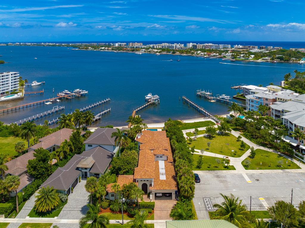 Welcome to paradise! Gorgeous views of the Intracoastal Waterway and short distance from Boynton Beach inlet. This home features four bedrooms in the main house and a guest cottage with private entrance and kitchen.  New heated infinity edge pool, updated kitchen and bathrooms in 2019, new roof also in 2019. Soaring ceilings, 24,000 lb boat lift, 40-kw generator, 30 foot ceilings, LED lighting, marble flooring, quartz countertops and viking appliances in the kitchen.  Walking distance to Old Key lime house, 3 blocks from the beach AND your own private white sandy beach! Panoramic views from enlarged master suite, huge closets, soak in your tub looking over the Intracoastal. Call me today to show!  

Home has been painted white, new photos and videos Coming SOON!