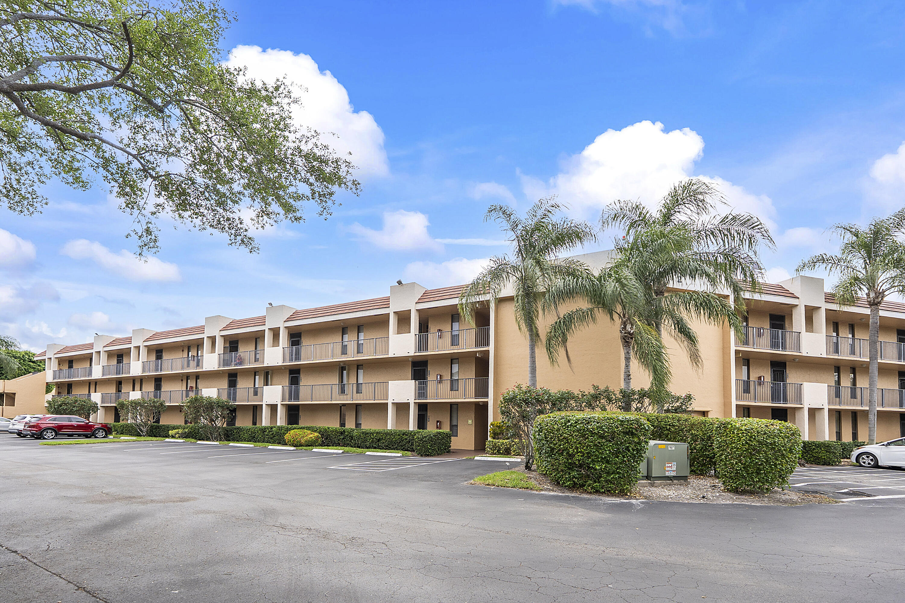 It's all about the water! Enjoy peaceful, sweeping lake views from this beautifully well-kept 2BR/2BA condo in the highly desirable 55+ community of Coral Lake. This bright and inviting unit offers plenty of storage throughout and the added convenience of a washer and dryer right in the unit—making everyday living easy and comfortable. Wake up to serene waterfront scenery and unwind in your own tranquil retreat. Residents enjoy access to three sparkling community pools, perfect for relaxing or socializing, as well as a scenic lakeside dock where you can take in the calming water views. Ideally located next to Coral Lake Park, offering tennis courts, pickleball, and green spaces for an active, outdoor lifestyle. A wonderful opportunity to enjoy low-maintenance living in a vibrant community, just minutes from shopping, dining, and everything South Florida has to offer.