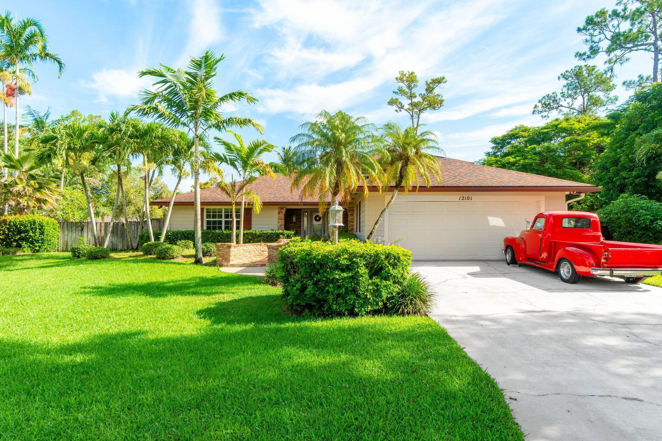 Welcome to 12101 Tumbleweed Court in Wellington, Florida—a beautifully updated home that combines luxury, comfort, and exceptional indoor-outdoor living in one of Wellington's most sought-after neighborhoods. From the moment you arrive, you'll appreciate the thoughtful upgrades and inviting atmosphere throughout. The heart of the home is the fully updated gourmet kitchen, featuring elegant quartzite countertops, stainless steel appliances, a gas range for the home chef, abundant cabinetry, and generous prep space that flows seamlessly into the living and dining areas. The spacious primary suite offers a true retreat, while the updated bathrooms provide a spa-inspired experience with designer finishes, modern fixtures, and luxurious amenities that create a relaxing escape at the end of  the day Step outside to your own private backyard oasis. The spectacular resort-style pool and expansive patio are designed for year-round Florida living and unforgettable entertaining. The outdoor space is complete with a summer kitchen, making it easy to host gatherings, weekend barbecues, or simply relax poolside in your own tropical paradise. Located in an exceptional Wellington neighborhood, this home offers the perfect blend of privacy, community, and convenience. Enjoy tree-lined streets, beautifully maintained surroundings, and close proximity to Wellington's renowned equestrian venues, top-rated schools, parks, shopping, dining, golf, and recreational amenities. Whether you're searching for a primary residence, seasonal retreat, or an entertainer's dream home, 12101 Tumbleweed Court delivers updated finishes, outstanding outdoor living, and an unbeatable Wellington lifestyle. Highlights: • Updated gourmet kitchen with quartz countertops • Gas range and stainless steel appliances • Beautifully renovated spa-inspired bathrooms • Resort-style pool with expansive patio • Outdoor summer kitchen for effortless entertaining • Spacious indoor and outdoor living areas • Prime location in one of Wellington's most desirable neighborhoods • Close to equestrian venues, parks, shopping, dining, and top-rated schools