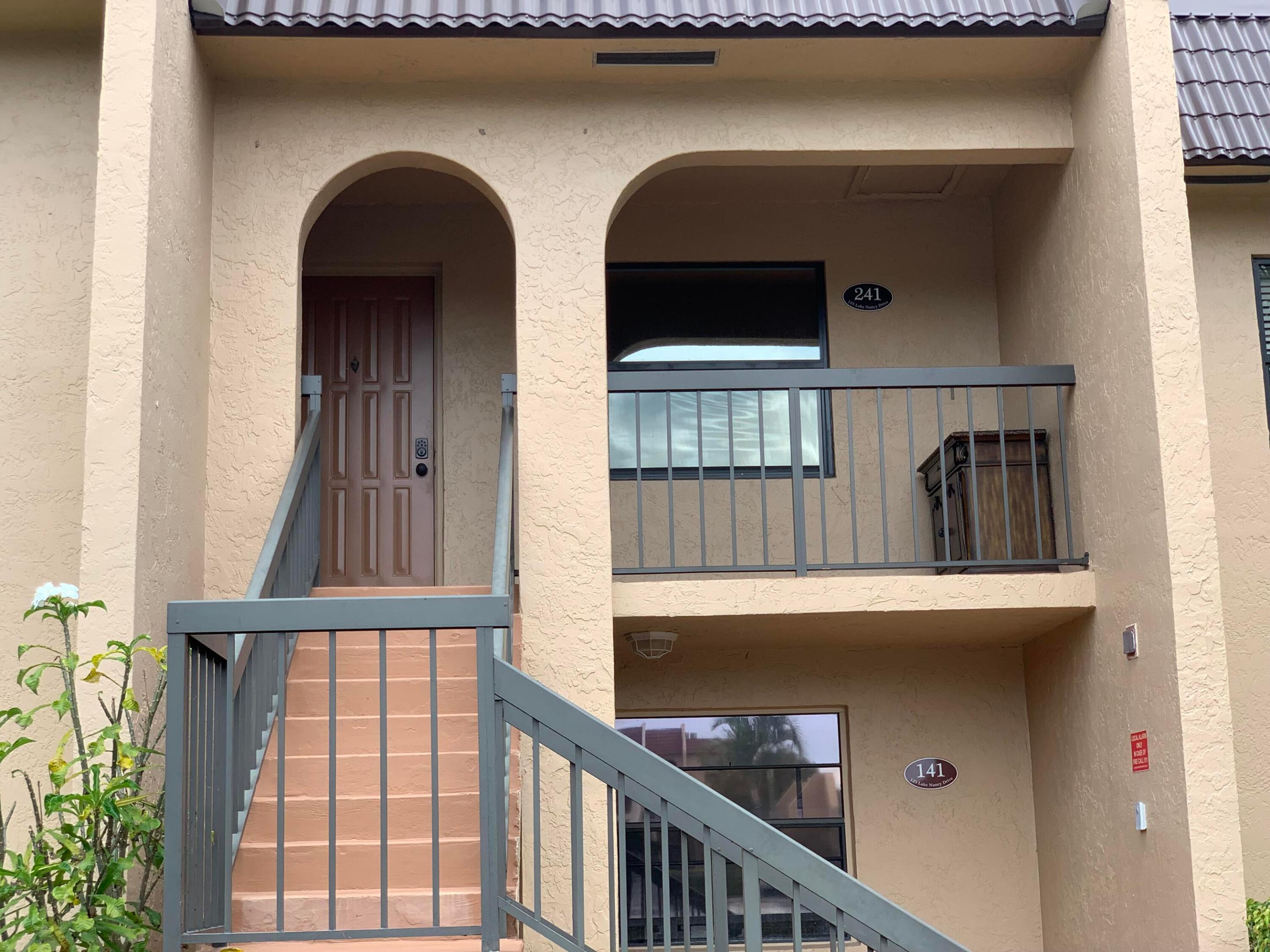 You'll feel at home the minute you step into this new and beautifully updated 2 bedroom 2 bath 2nd floor apartment in the fabulous Golden Lakes Condominium Community. This is a 55+ community. New, gorgeous tile flooring throughout, new appliances, new cabinetry -- hasn't been lived in since the renovation! Washer and Dryer in the apartment. Bright, sunny lanai with canal view. Directly Across from the Satellite pool. Park in front on your front door. You'll love living here!