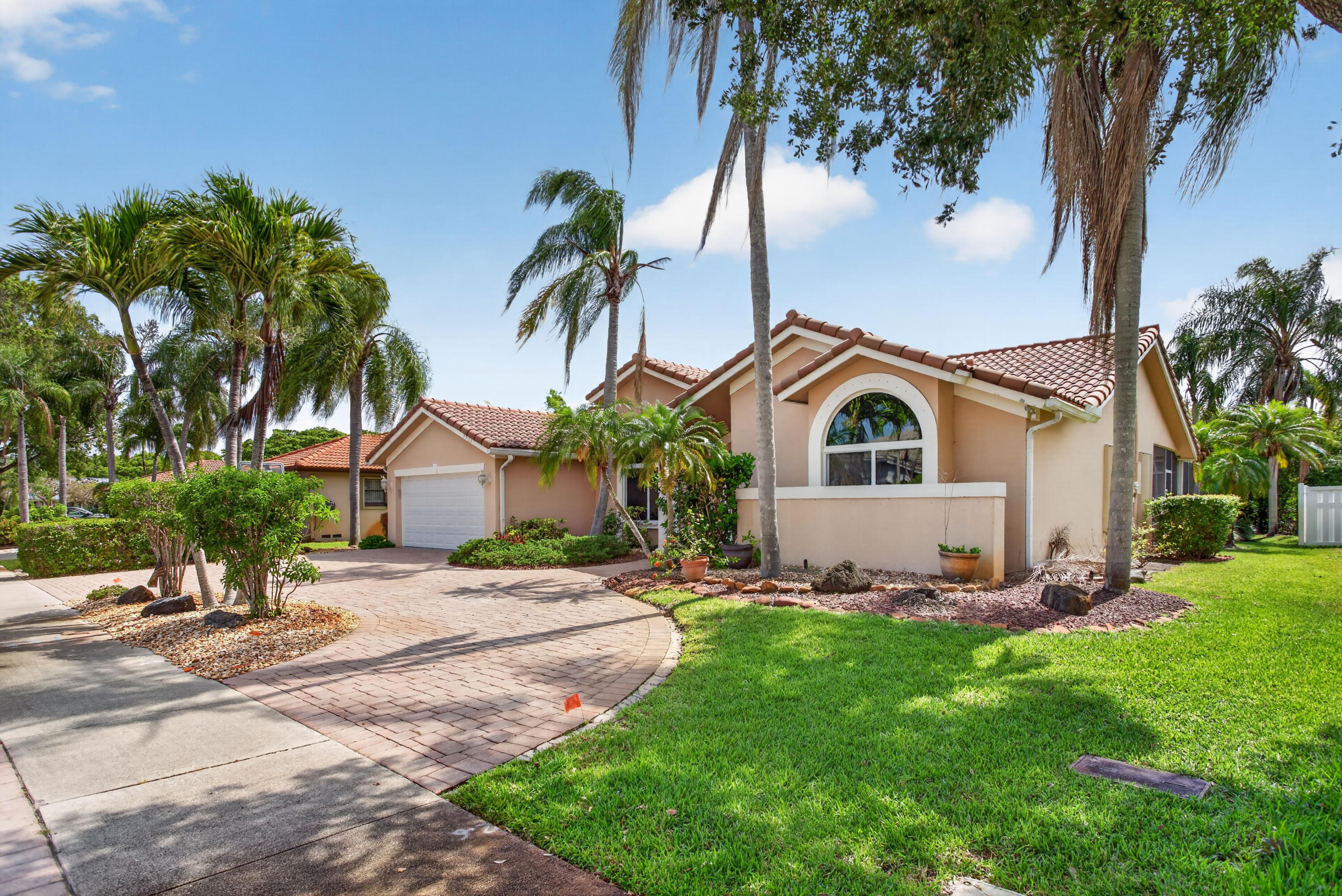 Welcome to this exceptional North Springs residence. Situated on an expansive 9,375-square-foot lot with no HOA, this well-maintained home offers over 2,400+ sq ft,  a two-car garage, and an impressive circular driveway. Recent improvements include a 2023 A/C, partial impact-rated windows and doors, and accordion shutters. Step outside to enjoy the screened-in patio overlooking your private pool and oversized backyard. Located in one of Coral Springs' most desirable neighborhoods and zoned for highly sought-after A-rated schools, this home offers an exceptional opportunity to make it your own while enjoying everything the North Springs community has to offer. Don't miss your chance to own this incredible property in a prime location.