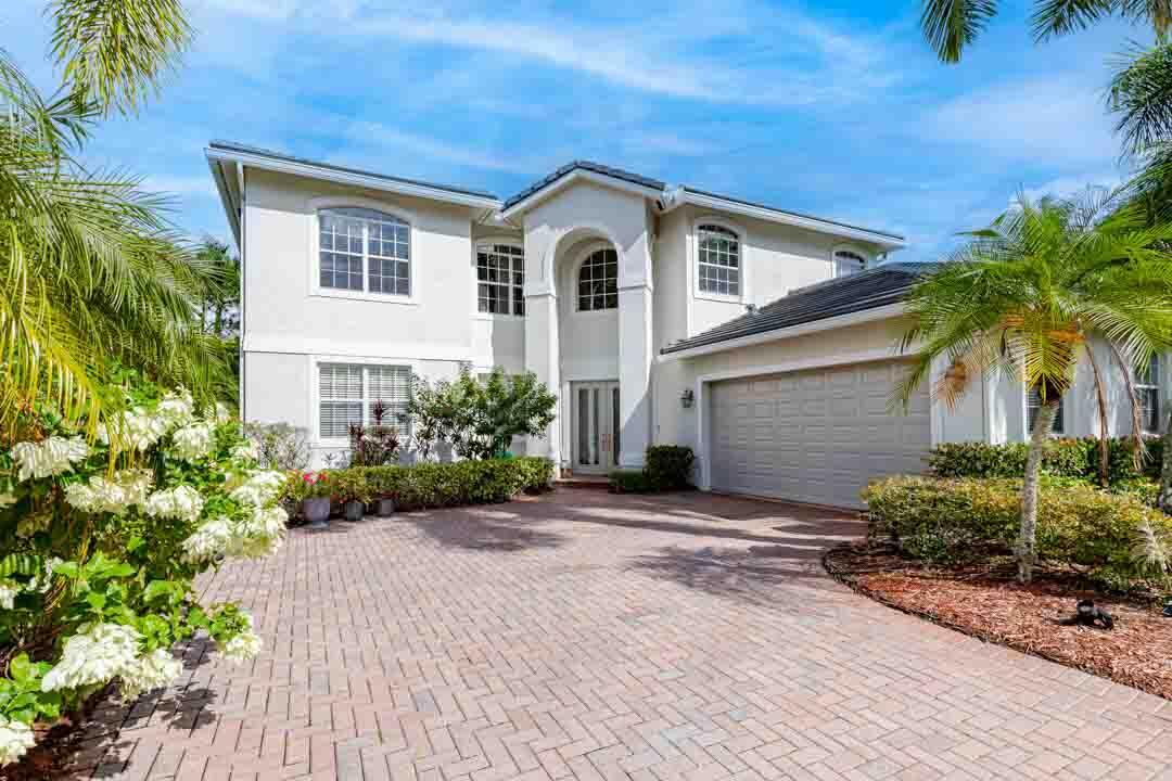 Beautiful Estates of  Hammock Creek  - This 5BR/3BA with New Roof home is located in one of Palm City's most sought-after gated communities featuring large homes, beautiful wooded & lakefront lots, low HOA fees & lots of amenities. Enjoy 3,538+/- sq. ft. of living space, formal living & dining rooms, crown molding, spacious kitchen w/gas cooking, ctr island, breakfast area & expansive walk-in pantry. The primary suite has a /sitting area & large closet & bath. Enjoy the 0.35-acre lot w/lovely backyard water feature & room for pool. HOA includes a stylish clubhouse w/kitchen, meeting rooms, pool, playground, basketball, pickleball, tennis, sidewalks & high-speed internet/cable. There's golf, a café & easy access to I-95 & FL Turnpike. The Treasure Coast offers lower taxes, c