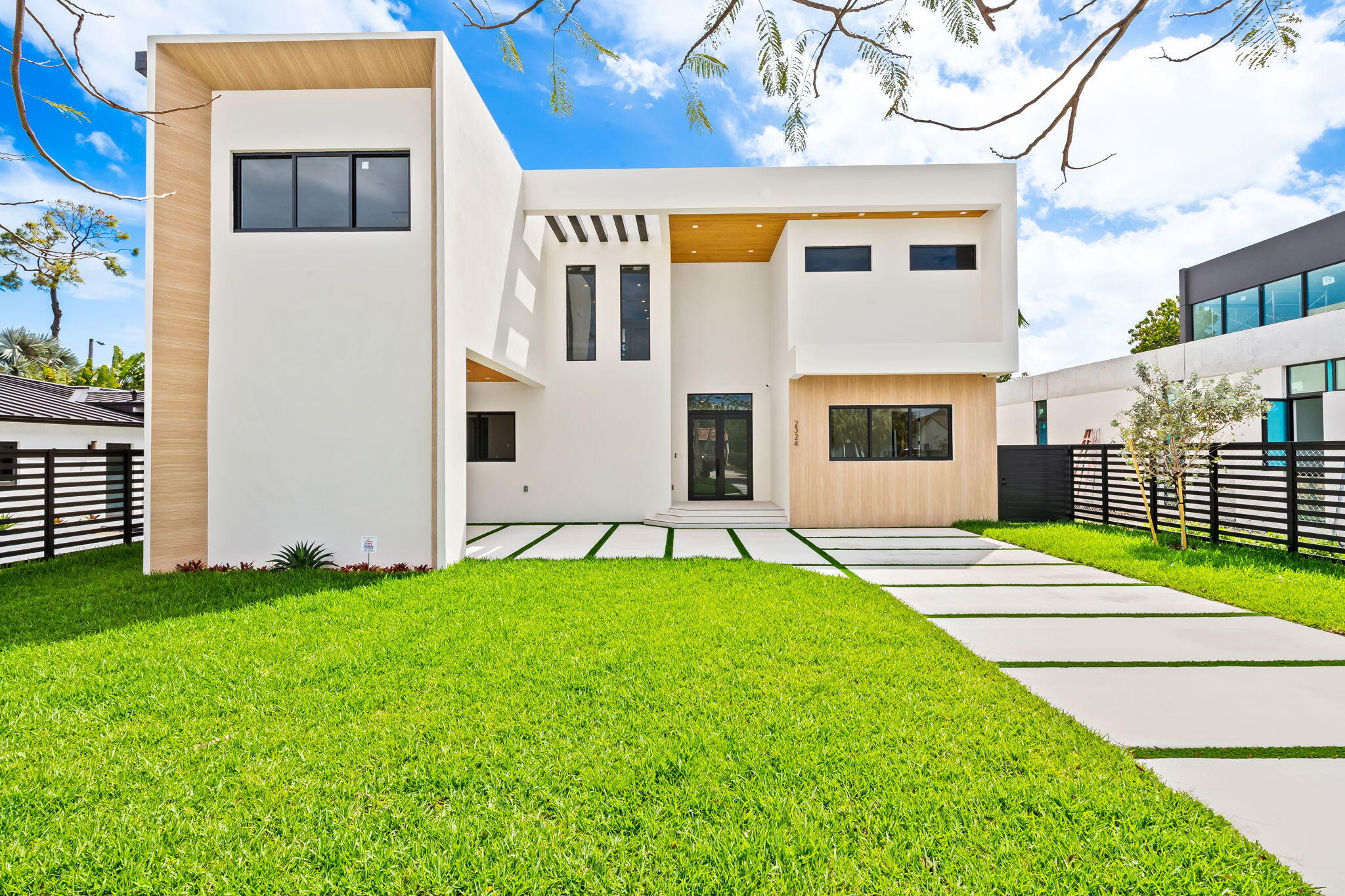 Welcome to this stunning brand-new construction home located in the highly desirable Silver Bluff neighborhood, offering the perfect blend of design, location, and lifestyle. This 5-bedroom, 5.5-bathroom residence spans 3,600 square feet, featuring soaring ceilings, a chef's kitchen with premium built-in appliances, and open-concept living areas ideal for everyday living & entertaining. Enjoy a private outdoor oasis with a resort-style pool, 2 oversized terraces, & a fully equipped outdoor kitchen with a built-in BBQ, ice maker, wine cooler, and refrigerator. Additional upgrades include a built-in Sonos system, integrated alarm system, & LED mirrors. Ideally located walking distance to Coconut Grove, the Underline, & 10 minutes to Brickell, top restaurants, & shopping. Completed Feb 2026!