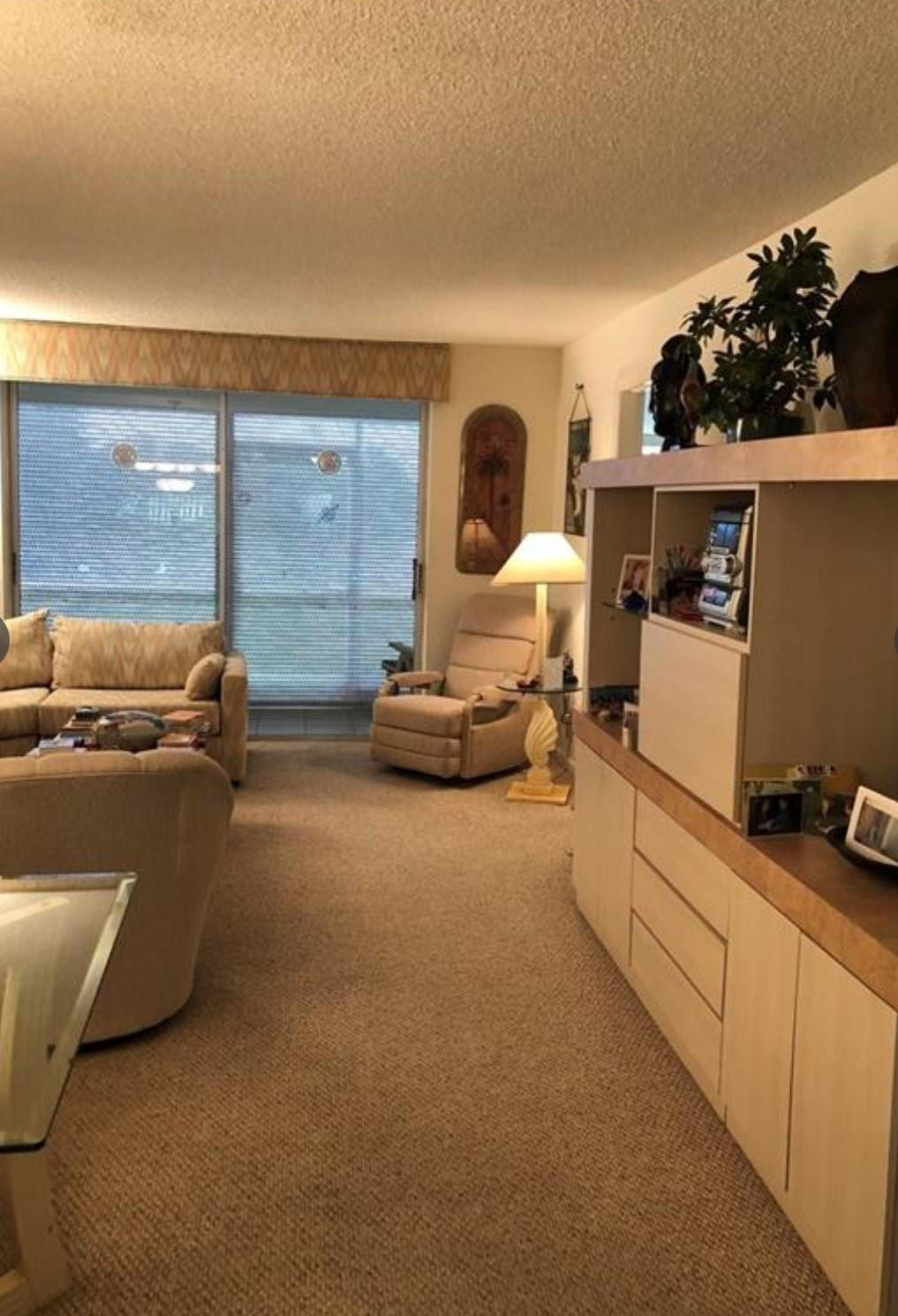 1ST FL CORNER END 2/2 UNIT WITH A LAKE VIEW IN SUNRISE. ENJOY MORNING COFFEE/TEA OR A GLASS OF WINE ON THE PEACEFUL AND QUIET ENCLOSED PATIO. THIS IS A VERY WELL-KEPT CONDOMINIUM WITH SO MUCH TO OFFER INCLUDING: TENNIS, SHUFFLEBOARD, CLUBHOUSE WITH GOLF, THEATER, BILLIARDS, EXERCISE, BINGO AND PLENTY OF ACTION. NO LEASING