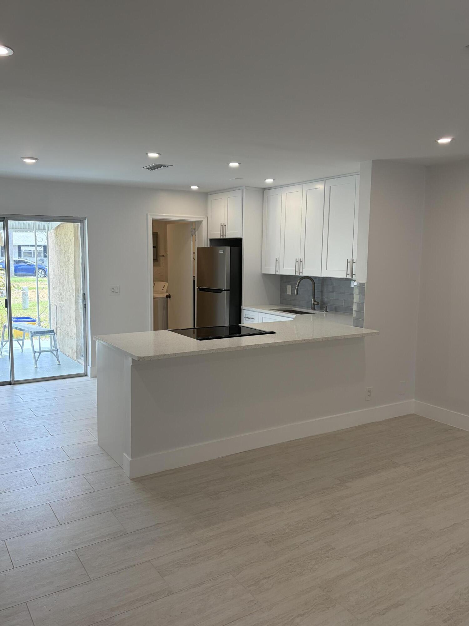 Welcome to this BEAUTIFULL REMODELED VILLA in Delray Beach. Ready for MOVE IN!  Step into this open BRIGHT brand NEW kitchen with TOP of the LINE appliances and beautiful COUNTER TOP'S AND BACK SPLASH. Extra large storage/ laundry room. LARGE COVERED OUTDOOR SPACE, GREAT FOR COOK OUTS. COMMUNITY HAS A POOL AND CLUB HOUSE. Excellent East Delray Location, minutes to BEACH, Downtown Delray with prime shopping, restaurants. music, art shows and all Delray has to offer.