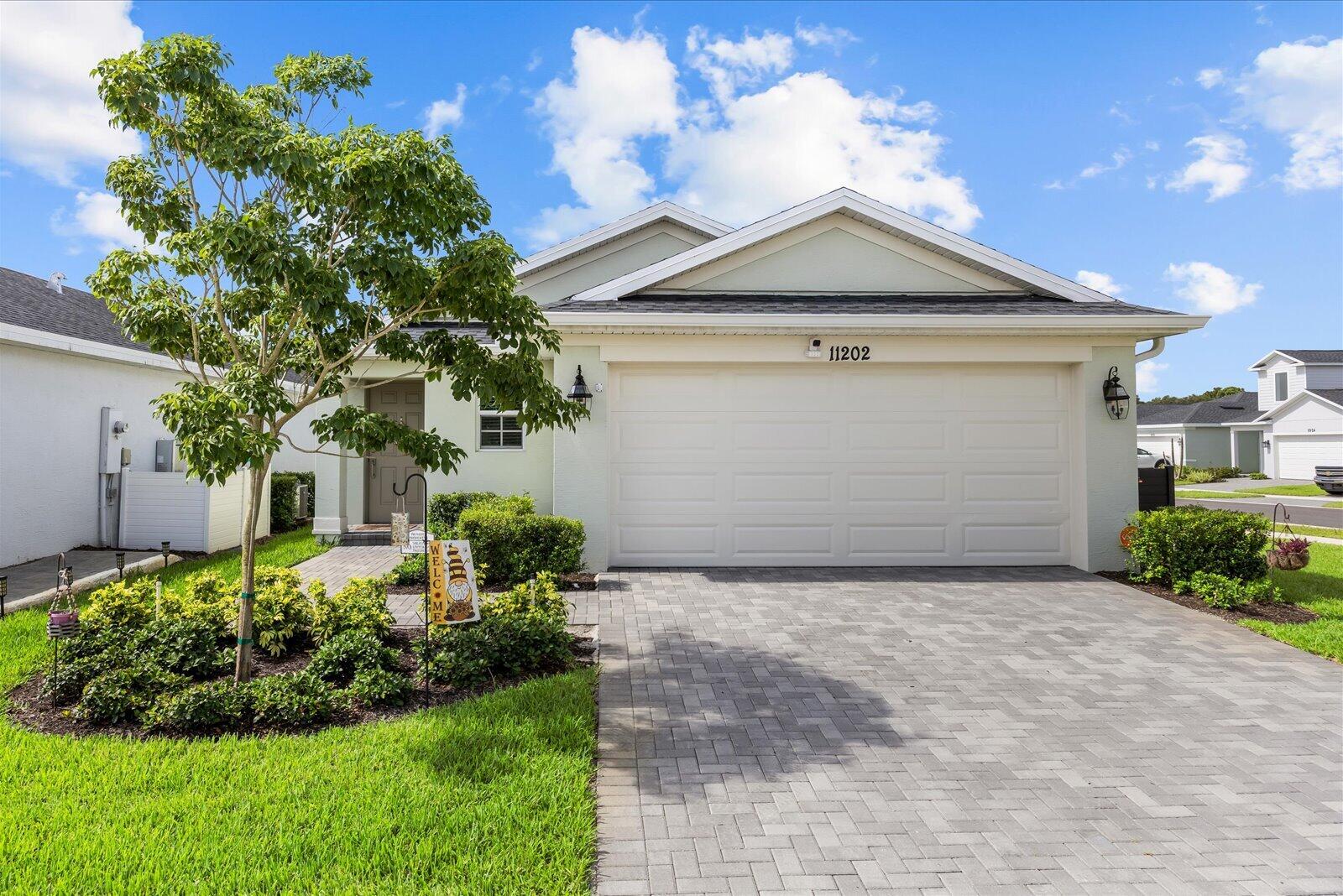 Welcome to this thoughtfully designed 3 bedroom, 2 bathroom residence located in Port St. Lucie, FL. This single-story home offers 1,451 square feet of finished living space, providing comfortable and efficient layout for everyday living. The attached 2-car garage offers convenient parking and storage solutions. Situated in an established community, this property presents an excellent opportunity for those seeking quality construction in a well-planned residential setting. Consider scheduling your showing today to experience all this home has to offer.