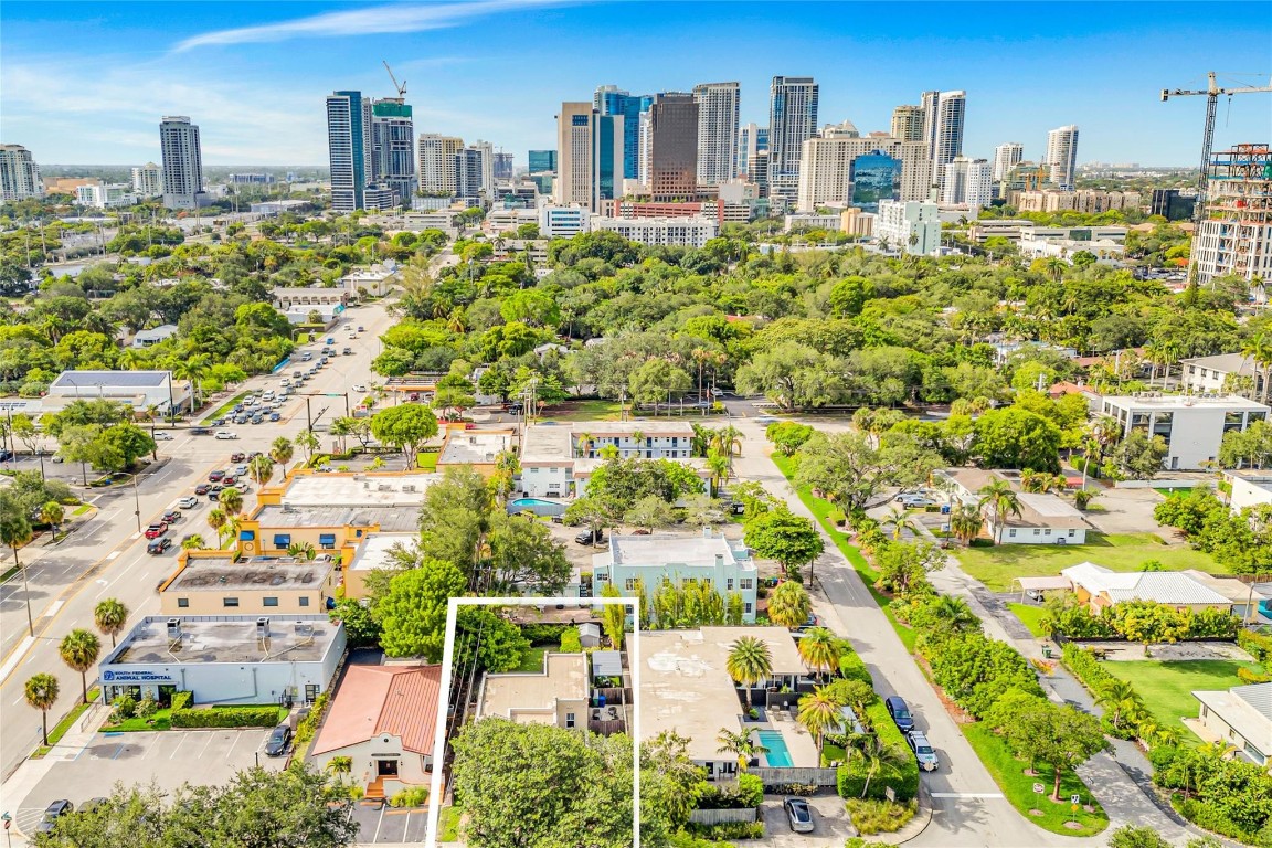 ZONED SRAC-SAE – One of Fort Lauderdale’s most powerful and flexible zoning designations! This fully renovated, fully furnished 2BR/1BA gem in Poinciana Park allows for bars, lounges, restaurants, cafés, retail, creative offices, venue space & more. A rare turnkey live/work setup with polished concrete floors, dramatic exposed wood-beamed ceilings, impact windows, designer finishes, and updated systems. Lush tropical landscaping, private screened porch, circular driveway, and space to expand, add a pool or create. Surrounded by rapid development and located minutes to Las Olas, Airport, Downtown, and the famed Fort Lauderdale beach. Refer to BCPA for accurate square footage. Adjacent parcels may also be available—ask for details! Welcome to 11 SE 13th Street – A Bold Opportunity in Fort Lauderdale’s Dynamic South Andrews Corridor (ZONED SRAC-SAE)This exceptional 2-bedroom, 1-bathroom property is more than just a beautifully renovated home—it’s a rare opportunity to own one of the most commercially flexible parcels available in the heart of Fort Lauderdale. With SRAC-SAE zoning (South RAC – South Andrews East), the possibilities here are nearly endless. Whether you’re an entrepreneur, investor, designer, restaurateur, or creative professional, this property allows you to bring your vision to life—without compromise.ZONING HIGHLIGHTS – SRAC-SAE (South RAC – South Andrews East):This designation permits a broad variety of uses, including:• Bars & lounges• Restaurants & cafés• Retail storefronts & showrooms• Creative studios & coworking spaces• Boutique offices• Event or performance venues• Art galleries & wellness concepts• Live/work environmentsThis zoning is exceptionally rare in a residential-style structure, creating a highly marketable and versatile asset for both owner-occupants and investors alike.Interior Features:This fully renovated property features dramatic design elements and modern systems throughout. Vaulted ceilings with exposed wood beams and industrial-style lighting create a loft-inspired atmosphere that pairs perfectly with the polished concrete floors and crisp, modern finishes. The open-concept kitchen features white high-gloss cabinetry, subway tile backsplash, stainless steel appliances, and a sleek island-style prep table. Designer fixtures, recessed lighting, and custom window treatments complete the elevated interior aesthetic.• Polished concrete floors• Impact-resistant windows and doors• Open-beam ceilings painted white for contrast• Fully renovated kitchen with high-end appliances• Modern lighting and hardware throughout• Spacious open-concept living/dining layout• Fully furnished with stylish décor – ready to move in or rentExterior Features:The charm begins curbside with the home’s Mediterranean-inspired façade, complete with a classic archway entrance and Spanish-style stucco. The large circular brick driveway offers plentiful parking for guests or customers. The screened-in front porch with patterned tile floors adds both charm and usability—perfect for enjoying Fort Lauderdale’s tropical weather in style.• Circular brick driveway• Screened-in front porch with arched columns• Mature palm trees and tropical landscaping• Fully fenced yard with privacy hedges• Room to expand or reimagine the footprintLocation, Location, Location:Set in the highly accessible Poinciana Park neighborhood, this property is surrounded by explosive development. High-rise residential towers, medical campuses, and mixed-use projects are all transforming the South Andrews corridor. You're just minutes to Las Olas Boulevard, Downtown Fort Lauderdale, the FLL Airport, and Fort Lauderdale Beach—positioned squarely between residential charm and urban growth.• 1 minute to Broward Health Medical• 5 minutes to Las Olas Blvd• 7 minutes to Fort Lauderdale-Hollywood Int’l Airport• 10 minutes to the beach• Surrounded by active and proposed commercial developmentsLive/Work or Investment Dream:This property is perfectly set up for a live/work scenario. Whether you’re a designer working from home, an artist looking for gallery space, or an entrepreneur wanting to open a boutique, juice bar, or wellness studio—the infrastructure is here and the zoning backs it up.It’s also an exceptional opportunity for Airbnb, short-term rental, or creative commercial lease strategies, particularly given its proximity to Downtown, the beach, and the airport.Added Bonus – Adjacent Parcels Potentially Available:Ask about additional properties adjacent to this lot that may be available for sale—offering the potential to assemble a larger footprint and expand your long-term vision.Summary:• 2BR/1BA fully renovated home• Zoned SRAC-SAE – ideal for commercial or creative use• Fully furnished – turnkey condition• Designer finishes, impact windows, modern systems• Room to expand on-site• Surrounded by explosive redevelopment• Minutes to airport, beach, Las Olas, and DowntownWhether you're buying as a long-term investment, launching a business, or creating the ultimate live/work lifestyle, 11 SE 13th Street offers unmatched potential in one of Fort Lauderdale’s fastest-growing districts.Showings by appointment only.