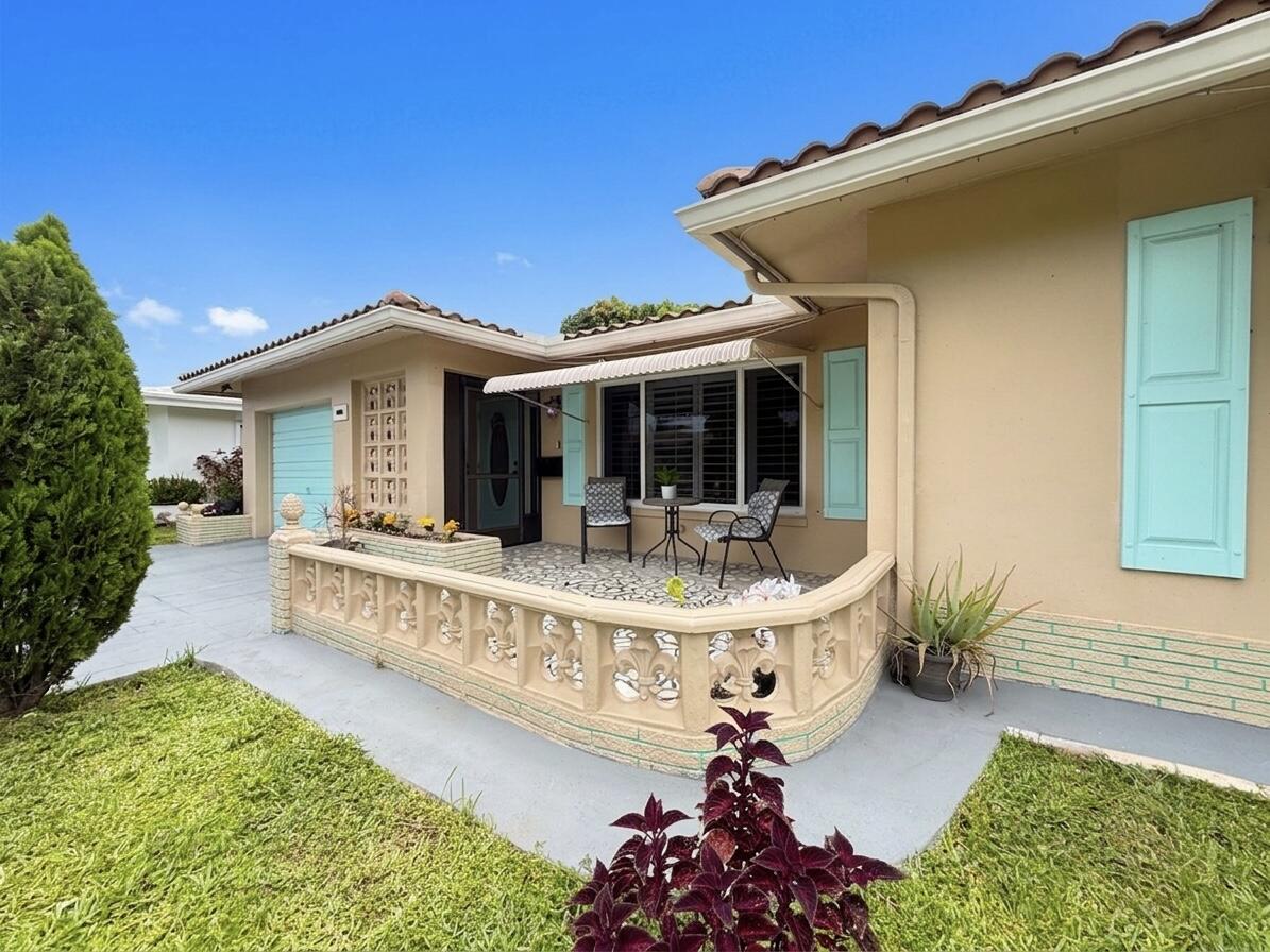 Welcome to one of the only legal 3 Bed, 2 Bath homes in the Mainlands 55+ Community. With over 1700 sq ft of living space, this home combines comfort & peace of mind with recent updates including Impact Windows throughout, New Ductwork (2026), Rheem Tankless HWH (2024), Electrical Panel (2024), AC (2017). Newer Refrigerator, Microwave, Samsung Washer & Dryer. Inside you will find Crown Molding, Plantation Shutters, Tile & Engineered Wood Flooring. Kitchen features Maple Shaker Cabinets & Granite Countertops. Enjoy your very own Mango, Sweetsop, June Plum, Banana, Coconut & Sugar Cane Trees. Low HOA dues cover lawncare, sprinkler system, Pool & Clubhouse. Children over 18 & Pets are Welcome! Conveniently located to Everything South Florida has to offer! Home Sweet Home!