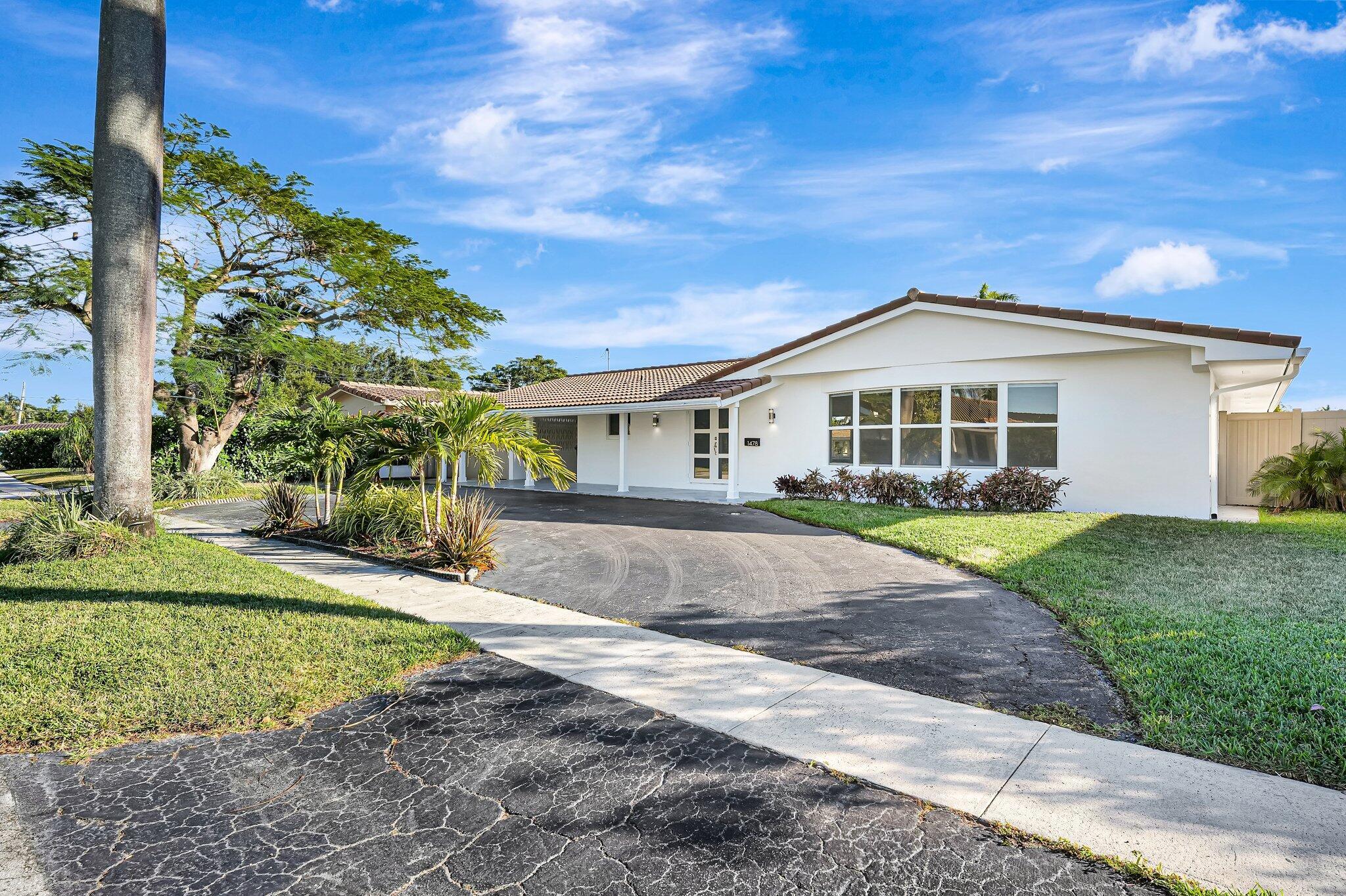 Located in the Highly Desirable Waterfront Community of Coral Ridge. This Home has been Completely Remodeled from Floor to Ceiling. Featuring Complete Impact Windows and Sliding Doors, Newer AC system with Blue Light Filter & 40 Gallon Hot water heater. All of the Sewer lines have been lined with PVC Piping (2024) Under Warranty. This is the Perfect home for outdoor living with its Stunning Water Views, 100 Ft Seawall, 24 ft Dock and Direct Access to the Intracoastal. This home has been meticulously upgraded, making it a turnkey property that combines luxury, functionality, and exceptional location. You are only a short drive away from FLL Airport, perfect for convenience for Travel. (Landscaping & Pool Service included. )