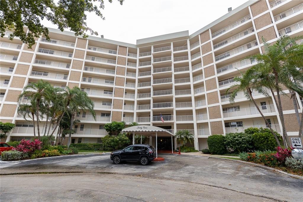 SELLER MOTIVATED! Gorgeous and totally renovated 2/2 unit at the desired Palm-Aire Condominium in Pompano Beach, close to the Casino. Kitchen completely opened up with room for bar stools, new electrical panel, porcelain tiles, nice view. Association requires 20% down payment. Sold "As is" with right to inspect.