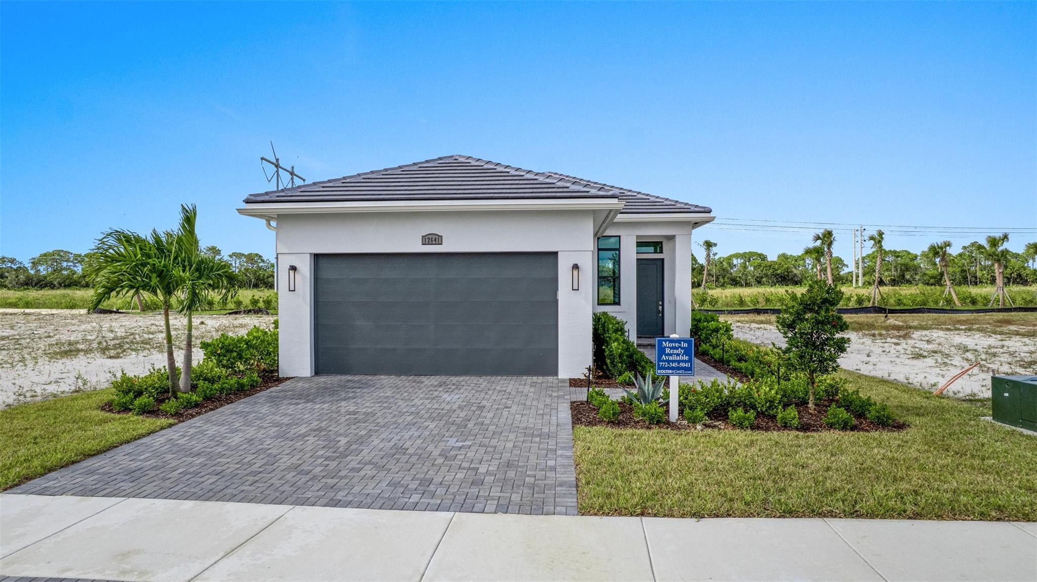 Quick Move-in, No rear neighbors homesite. This Allison floor plan features a 2 bedroom, 2 bath home, a flex room, and 2 car garage open-concept layout.  9' W by 10' tall sliding glass doors that connects the great room to the covered lanai. The Kitchen includes second tier kitchen cabinets and crown moulding, and under cabinet LED lighting. The Owner's Suite offers a spa-like retreat, featuring a frameless shower enclosure. All in a resort style community.  Discover luxury living at PGA Village Verano, with resort-style amenities: private Pickleball Center with 27 courts, fitness facilities, indoor and outdoor pools, tennis, bocce, and basketball courts. Includes access to PGA Golf Club for its members, plus billiards, library, kitchen, and a full-time Lifestyle Director.