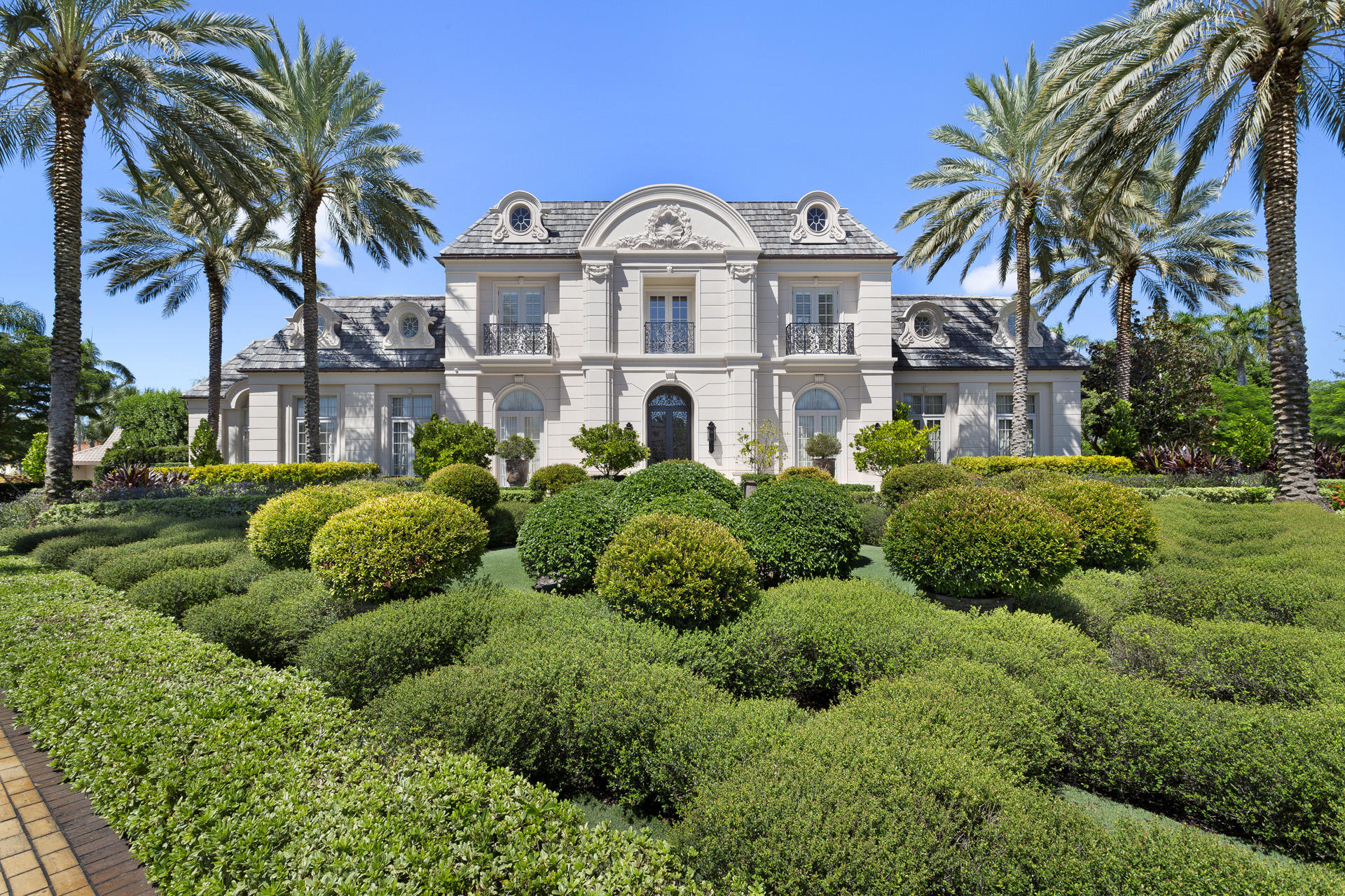 Offered Fully furnished negotiable! A manicured formal Renaissance garden, reminiscent of a 17th century royal retreat, is flawlessly blended with its tropical setting. A formal marble reflecting pool is set among an allée of Bougainvillea, walking paths, all surrounded by fifty+ varieties of native and exotic plants. An oversized sun-splashed heated swimming pool with fountain, separate circular spa, expansive covered poolside loggia with snack bar, and circular motor court with ample parking complete this 1.21±-acre property. DISCLAIMER: Information published or otherwise provided by the listing company and its representatives including but not limited to prices, measurements, square footages, lot sizes, calculations and statistics are deemed reliable but are not guaranteed and are subject to errors, omissions or changes without notice. All such information should be independently verified by any prospective purchaser or seller. Parties should perform their own due diligence to verify such information prior to a sale or listing. Listing company expressly disclaims any warranty or representation regarding such information. Prices published are either list price, sold price, and/or last asking price. The listing company participates in the Multiple Listing Service and IDX. The properties published as listed and sold are not necessarily exclusive to listing company and may be listed or have sold with other members of the Multiple Listing Service. Transactions where listing company represented both buyers and sellers are calculated as two sales. The listing company's marketplace is all of the following: Vero Beach, Town of Orchid, Indian River Shores, Town of Palm Beach, West Palm Beach, Manalapan Beach, Point Manalapan, Hypoluxo Island, Ocean Ridge, Gulf Stream, Delray Beach, Highland Beach, Boca Raton, East Deerfield Beach, Hillsboro Beach, Hillsboro Shores, East Pompano Beach, Lighthouse Point, Sea Ranch Lakes and Fort Lauderdale. Cooperating brokers are advised that in the event of a Buyer default, no commission will be paid to a cooperating Broker on the Deposits retained by the Seller. No commissions are paid to any cooperating broker until title passes or upon actual commencement of a lease. Some affiliations may not be applicable to certain geographic areas. If your property is currently listed with another broker, please disregard any solicitation for services. Copyright 2020 listing company All Rights Reserved.