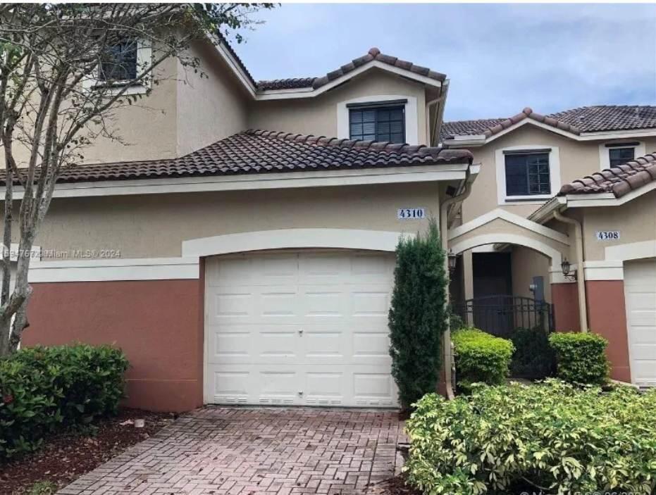 Great Townhome with backyard... walking distance to top rated "A" schools (Manatee Bay Elementary, Falcon Cove Middle, Cypress Bay High School), Vista park and Weston Regional library. Hurricane shutters & tile on first floor, high impact windows & wooden floors on the  2nd... Crown molding throughout.  Gated community with swimming pool.  Non- smokers. Tenant occupied, showings by appointment only.  Bathrooms will be remodeled before new tenants move-in.  Rental available between August  1-15. Don't Miss Out call today!