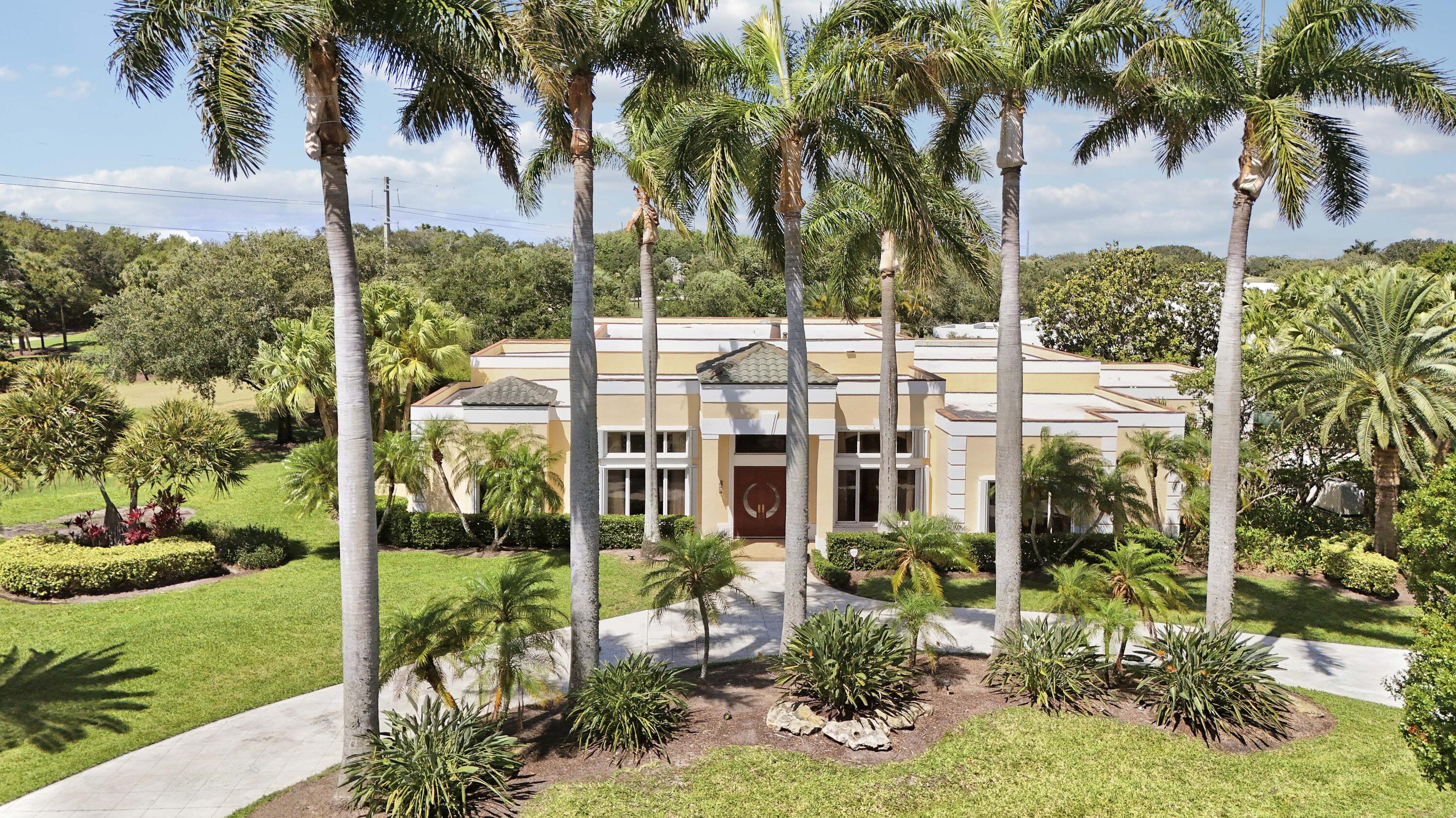 Rarely does an opportunity like this come to market in Admirals Cove. Build your dream estate or unlock the full potential of one of Admirals Cove's most compelling properties. Set on a rare .65-acre golf course lot on prestigious Spyglass Lane, this single-story CBS home offers an extraordinary opportunity to enjoy now, renovate to perfection, or create a spectacular new custom residence with the potential for Intracoastal views.  With 4,393 square feet under air and more than 6,100 total square feet, the home features soaring ceilings, expansive open living spaces, a large kitchen, and a generous primary suite. Outside, a screened patio, private pool, and lush tropical landscaping create a serene setting for relaxed living and entertaining. The garage accommodates two cars plus one golf  cart, completing the ideal country club lifestyle package.  Surrounded by newly built luxury estates and located just moments from The Club at Admirals Cove's premier amenities and activities, this is a rare chance to secure a prime property in one of Jupiter's most coveted communities. Golf membership available, please see documents.