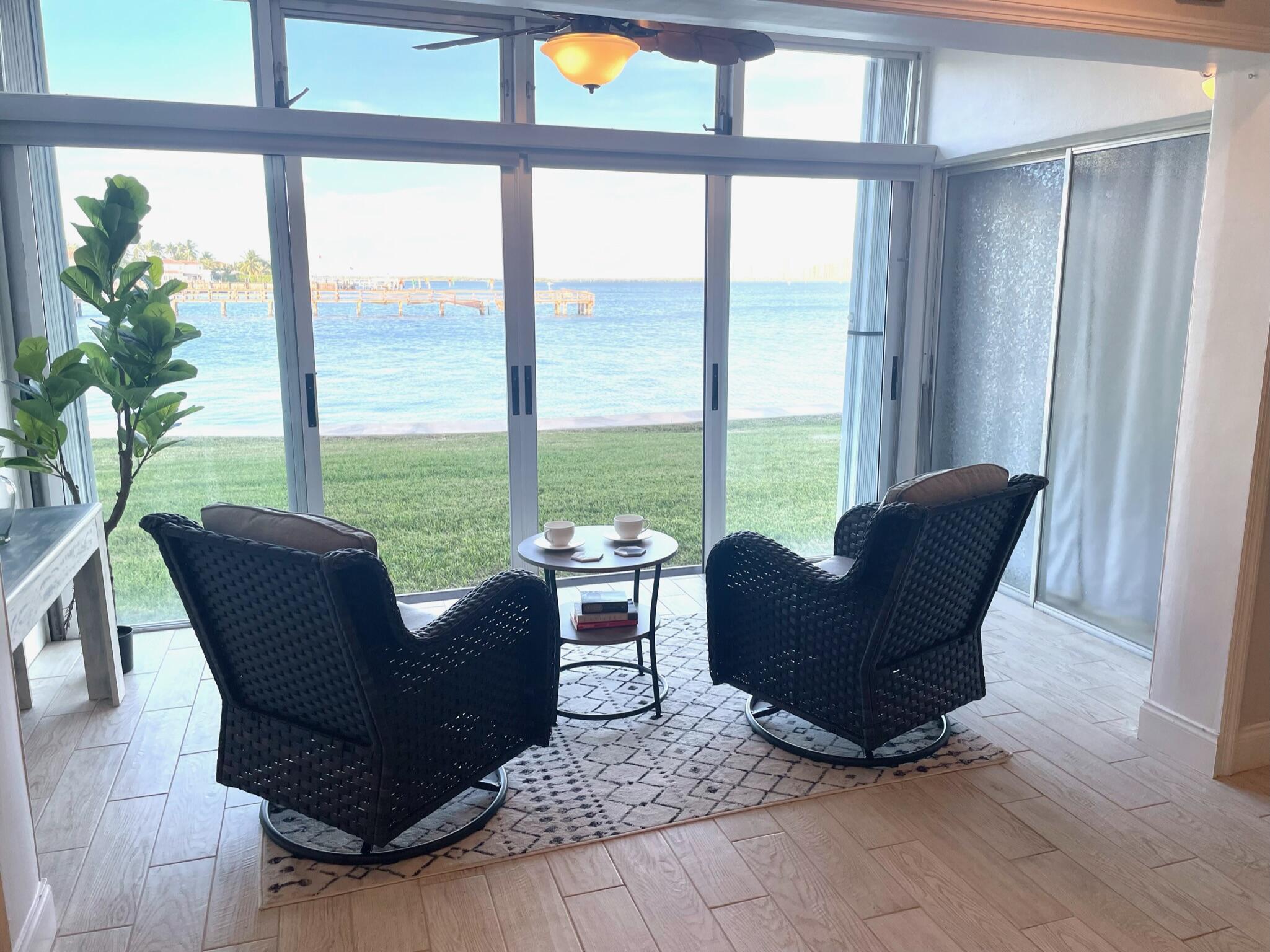 Waterfront Living at Its Finest - Ground Floor 2 Bed/2 Bath Condo! Welcome to your serene slice of paradise! This beautifully maintained 2-bedroom, 2-bathroom condo offers direct waterfront views and the convenience of first-floor living—no stairs, no hassle. Step inside to find a bright, open-concept layout featuring a spacious living area that flows seamlessly to a Florida room—perfect for enjoying morning coffee or evening sunsets by the water.  90 day minimum rentals, NO ANNUAL RENTALS, $3000 during off season, $4000 during season.  ** available again for JAN 1, 2027**