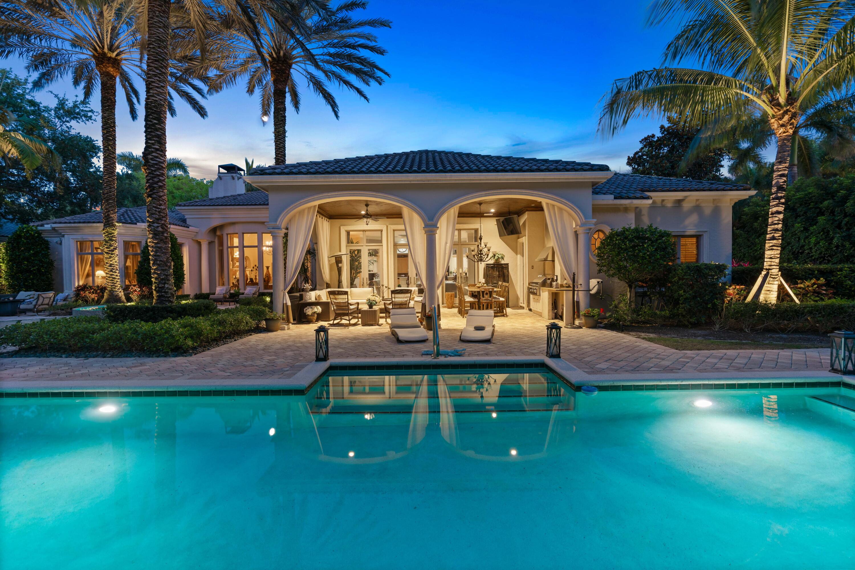 Welcome to 11711 Tulipa Ct. located in the Grand Estates of the exclusive Old Palm Golf Club. This 5500 sf home is situated on an oversized lot providing an elegant garden style yard complete with bocce court, large pool and spa. This home has a lovely layout with 4 bedrooms and 4.1 baths. All guest rooms are en suite lending to very private spaces for loved ones. A unique feature is the enclosed bonus room furnished with pool table and wine storage. The bar in the formal area allows one to utilize the formal sitting and dining room. The office is another space where one can escape. Old Palm Golf Club has an 18 hole Raymond Floyd design course, a 33 acre practice facility, new 20,000 sf lifestyle center, spa and much more.  Membership mandatory.