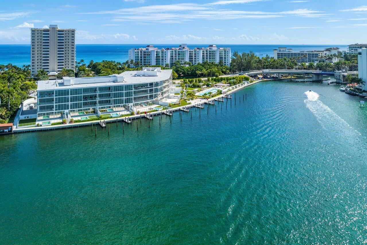 Unveiling Residence 202 at Boca Beach Residences & Marina - Boca Raton's prestigious newly completed condominium with unparalleled views of Lake Boca + Optional Private Boat Dockage Available to Purchase separately!  Brand-New, Chic, and Modern in Design, Residence 202 will impress the most discerning clientele featuring an east-west flow-through Residence sprawling 4,205 sq/ft under air, 3 Bdrms Ensuite +(4th Bdrm/Den option), 4 Baths! Beautifully designed interiors display European White Oak flooring in all main living spaces, impeccable ceiling and lighting details, Italian custom cabinetry, an expansive terrace overlooking Lake Boca that is sure to transform any evening at home into an unforgettable experience. Private 2-car Garage + a 3rd garage space complete this Offering! Boca Beach Residences & Marina offers a luxurious lifestyle w/ with stunning landscape aesthetics and magnificent artistically designed common spaces curated by the widely acclaimed LRI Interiors, superb amenities including 24-hour doorman, valet, a relaxation deck directly on Lake Boca with a swimming pool, separate Spa/Jacuzzi, daybeds, and lounge chairs, state-of-the-art fitness center, a spa treatment room, Separate His and Her steam and saunas for the ultimate in privacy and pampering. As an added bonus, this premium location offers walkability to The Boca Raton, a world-class Beach Resort and Spa (separate membership required).