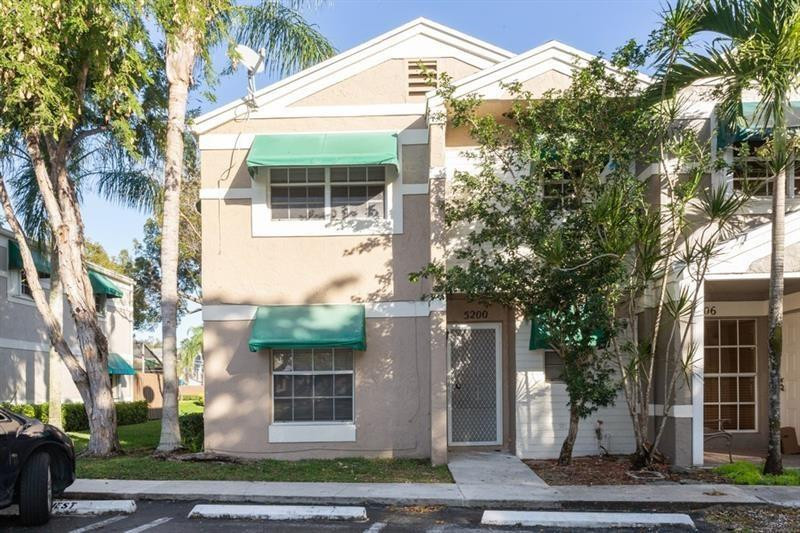 Welcome to this charming two-story townhouse located in Flamingo Gardens Phase Four in Cooper City. This waterfront property offers 1,223 square feet of finished living space with two bedrooms and 2.5 bathrooms, providing comfortable accommodations across two levels. The thoughtful layout maximizes functionality while the waterfront location adds a distinctive appeal to this residence. Large screened porch overlooking the lake,  This townhouse presents an excellent opportunity for those seeking a well-proportioned home in an established community. Washer/Dryer in storage area in porch. Steps to the pool. Available July 1st, quick move in.