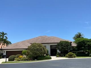 JUST LISTED IN TANGLEWOOD IN BROKEN SOUND Country Club.  Beautifully remodeled and MOVE IN READY.  This spectacular 1 story, 3 bedroom plus library/den residence offers luxury at every turn. Situated on an oversized golf course lot, this home features a breathtaking backyard with a resort-style pool/spa, plus an expansive covered and screened in Lani with serene golf course views.  Inside, you'll find  a large open split floor plan with tall ceilings, a state-of-the-art  movie theatre, a stunning chef's kitchen with premium Sub-Zero refrigerator and freezer, a gas stove, custom cabinetry and high-end finishes throughout plus a FULL house generator.  This exceptional home seamlessly blends sophisticated design with everyday comfort and is truly one of Broken Sounds finest offerings.