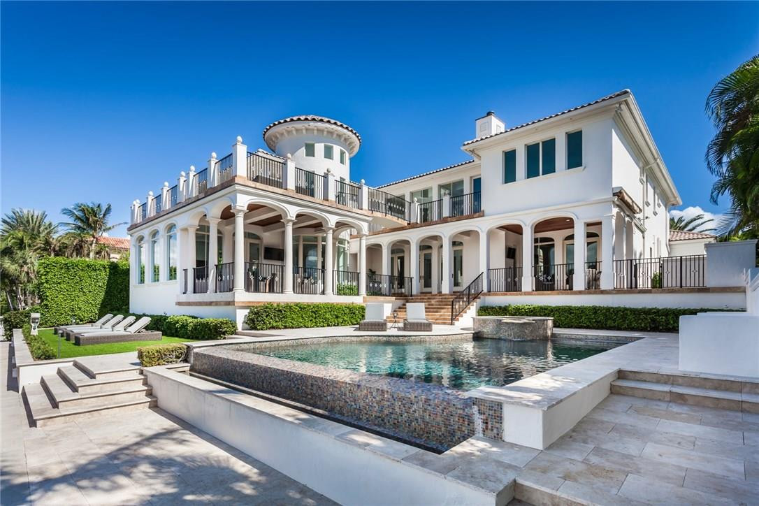 Gated Direct Intracoastal Estate Newly Redone for 2018 located in No Wake Zone minutes to Lake Boca & the Inlet. Unbelievable Club Room with Theater, Waterfront Office, Billiards, Bar, and Sitting Area. Gorgeous Multi-Tier Outdoor Living Space with Fabulous Pool and Spa overlooking the water. This Exquisite Home has it all - 4 Car Garage, Elevator, Separate Master Baths, Huge Balcony Areas with Bridge, Chef's Summer Kitchen, Two Outdoor Covered Loggias, Full Crestron Smart Home/Media, and much more.