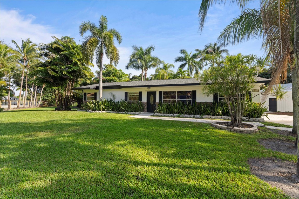 Ranch Style home w gated entry on private pie shaped Cul du Sac. Just painted inside and out. New kitchen and flooring throughout. Very private landscaped Builder's acre featuring a resort style patio & pool and detached 30x40 garage/workshop w long driveway & high ceilings that can accommodate boats, cars or an RV. Formal living & dining, spacious kitchen w adjacent pantry & laundry room, nice sized Master Suite and bath overlooks covered, screened patio & open pool. Newer roof, very clean condition. No commercial businesses or storage of heavy equipment is permitted. Credit & Background require through Landlord vendor at Tenant expense. Do not disturb tenant. Watch for SCAM requests for money upfront. This is not posted on a website that would ask for cash sight unseen in advance. Pool waterfall not operational but pool is fine, garage building is a garage and does not have AC, it's a storage space and not living area. Front gate does not have a remote opener