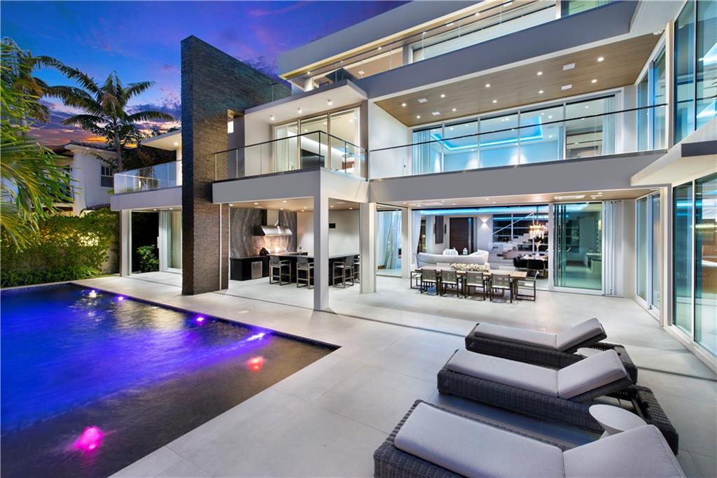 Most luxurious gated Waterfront Estate in the prestigious Las Olas Isles in Fort Lauderdale. Designed by Michael Gray Interiors with the finest finishes. This estate offers 131 ft of water frontage with easy ocean access, a lap pool with sun shelf, spa, summer kitchen & cabana bath with steam shower & sauna. Enjoy the best outdoor living in South Florida. Over 9500 sqft with 7 bedrooms, 9.5 bathrooms, office, 3 gas fireplaces, custom elevator, designer kitchen featuring Sub-Zero & Wolf appliances. The 3rd Floor club room is great for entertaining with wet bar and stunning views from sunrise to sunset. Feel the ocean breezes. Spectacular floor plan. Separate entrance for full mother-in-law/staff suite. Smart home technology. Only Minutes to shops, dining, beach, & airport. A Must see.