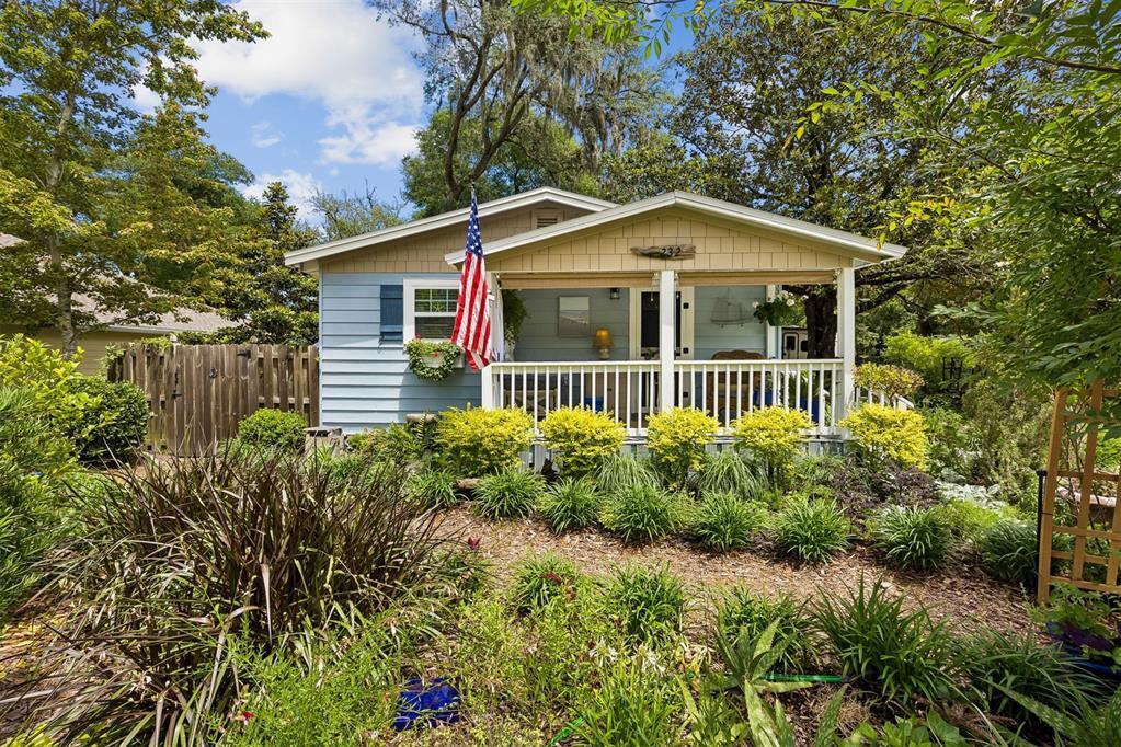 Completely Remodeled in 2017 all within walking distance of downtown Amelia Island. This charming cottage offers the perfect blend of cozy comfort and coastal charm. Surrounded by lush, thoughtfully designed landscaping, the home feels like a private retreat with plenty of extra driveway space to have all your new friends over. Inside, warm, inviting spaces are filled with natural light and outside sit on your front porch or dine al-fresco on your courtyard. A detached oversized one-car garage with plumbing and EXTRA storage space, not included in sq ft, adds convenience. Ideal as a getaway or full-time residence, this cottage captures the essence of island living in a truly enchanting way. Walk your way to downtown or use your golf cart explore the beaches and Island.  AC 2026, Cameras and audio