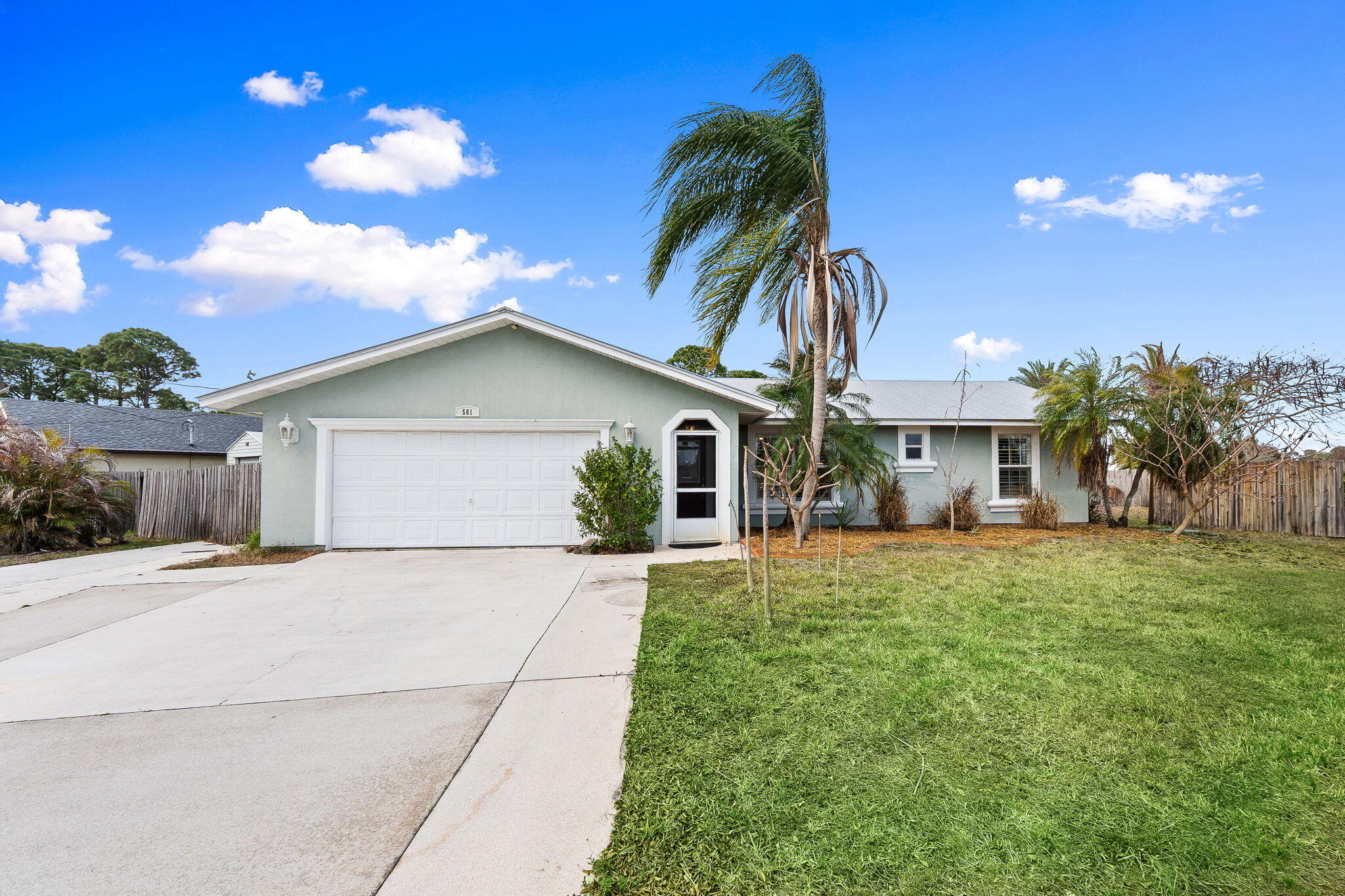 Seller NOW OFFERING $10,000 buyer credit towards upgrades, prepaids, or closing costs! Explore this 4 Bed, 2 Bath pool home offering 1,800 sq ft under air on a fully fenced corner lot. This home features a spacious layout filled with natural light and triple sliding glass doors that open to the pool area, creating a seamless indoor-outdoor living experience perfect for entertaining. The primary suite also offers direct access to the covered patio and pool, adding to the home's ideal Florida lifestyle appeal.  The layout includes additional functional space and flexible areas that can be adapted to fit your needs, whether you're looking for a home office, gym, or just need extra storage.  Step outside to your private backyard oasis, complete with a pool, covered patio, and fully fenced yard - perfect for relaxing, entertaining, or enjoying year-round outdoor living. With a 2016 metal roof and solid bones, this property presents a great opportunity to update and personalize while building equity. The corner lot adds extra space, privacy, and curb appeal.  Conveniently located near shopping, dining, schools, and major roadways, this home offers both value and potential in a desirable Port St. Lucie​​‌​​​​‌​‌​​​‌‌​​​‌‌‌​​‌​​‌‌​​​​ location.