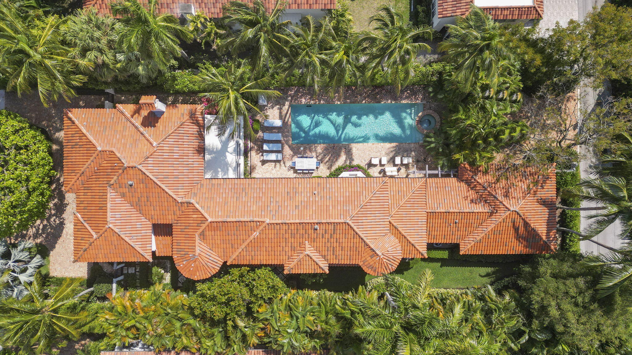 Fully Furnished - Beautifully renovated 4BR/6.1BA Mediterranean estate on prestigious Barton Avenue. Custom gourmet kitchen with butler's pantry, light and bright open living areas. Outdoor living and dining room with fireplace overlooking the tropical landscape, pool/spa, perfect for entertaining or dining alfresco.