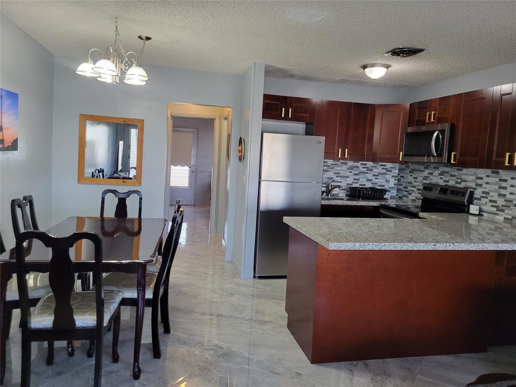 Remodeled 1 bedroom & 1 bath on 2nd floor. Floors are 18 inch ceramic tile. New open kitchen with counter seating with new cabinets, countertop, backsplash, and stainless appliances. All new bathroom with sliding shower doors, new toilet and vanity. New split a/c unit keeps unit icy cool. Nicely furnished. Association amenities include: heated swimming pool, active clubhouse, exercise room, library, billiards, walk/jog path and more. Low monthly association fees. Updated furnished 1/1, 55+
