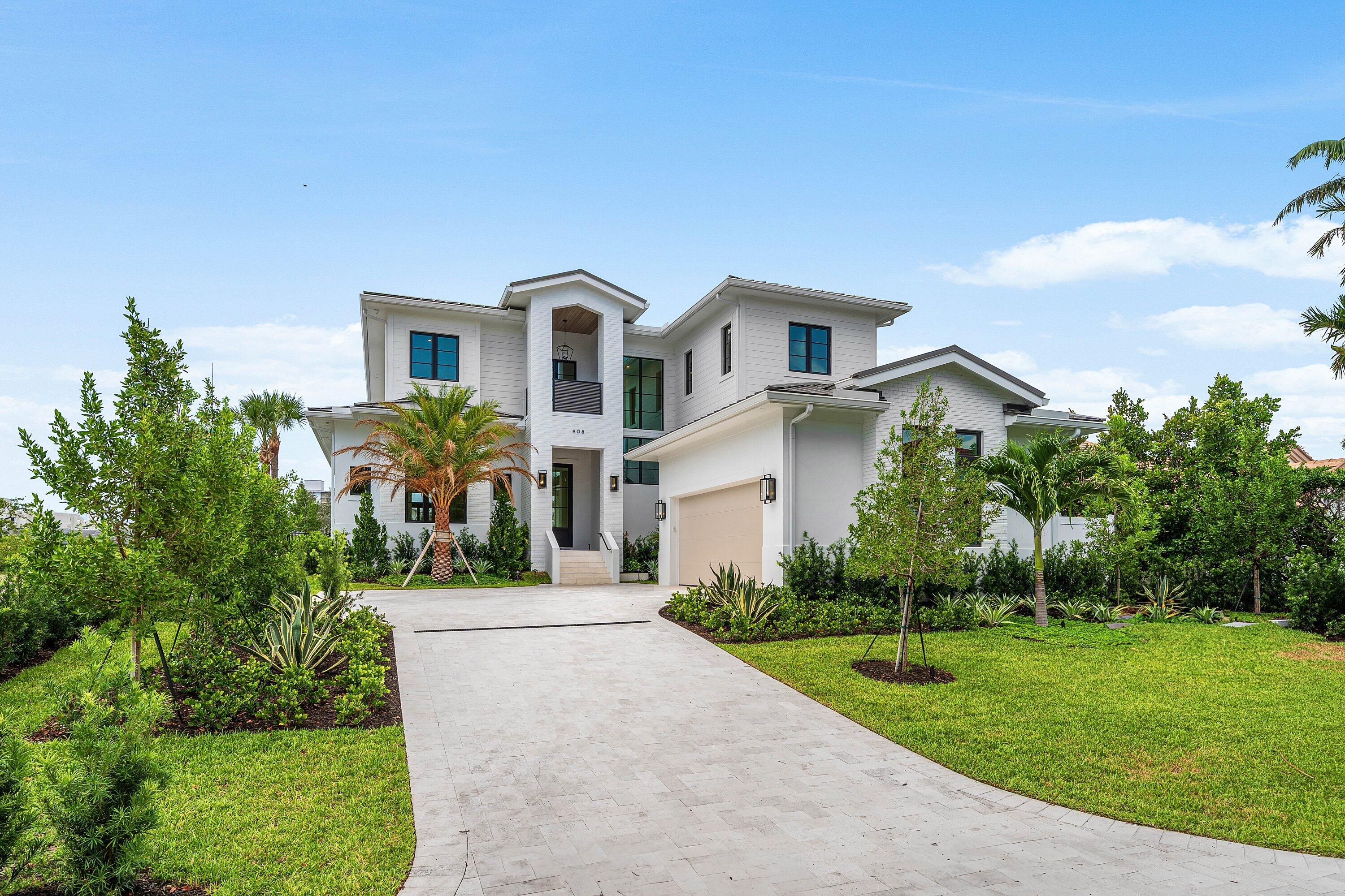 Introducing a brand-new waterfront residence on Hypoluxo Island. This recently completed estate was built by Varga Homes and thoughtfully designed by Ava Gray Interiors. This five-bedroom, seven-bathroom coastal estate is designed for effortless luxury living, the home also features a highly desirable first-floor primary suite, offering privacy, convenience, and serene water views. The spacious retreat includes dual walk-in closets and a spa-inspired bath with elevated designer finishes. The open-concept living areas are flooded with natural light, with expansive glass doors that seamlessly connect the great room and chef's kitchen to the covered outdoor living space. The kitchen features custom cabinetry, premium appliances, and a statement island ideal for entertaining. Upstairs, four additional en-suite bedrooms provide comfort and flexibility for family and guests. Outdoor living is equally impressive, with a resort-style pool, covered loggia, and a brand-new private dock offering direct water access -- perfect for boating enthusiasts and enjoying the South Florida lifestyle. Ideally located just minutes from Palm Beach and Delray Beach, and close to the renowned Eau Palm Beach Hotel & Spa, this property offers the rare opportunity to own a new construction waterfront home on sought-after Hypoluxo Island. A refined island retreat blending luxury, comfort, and premier boating access.