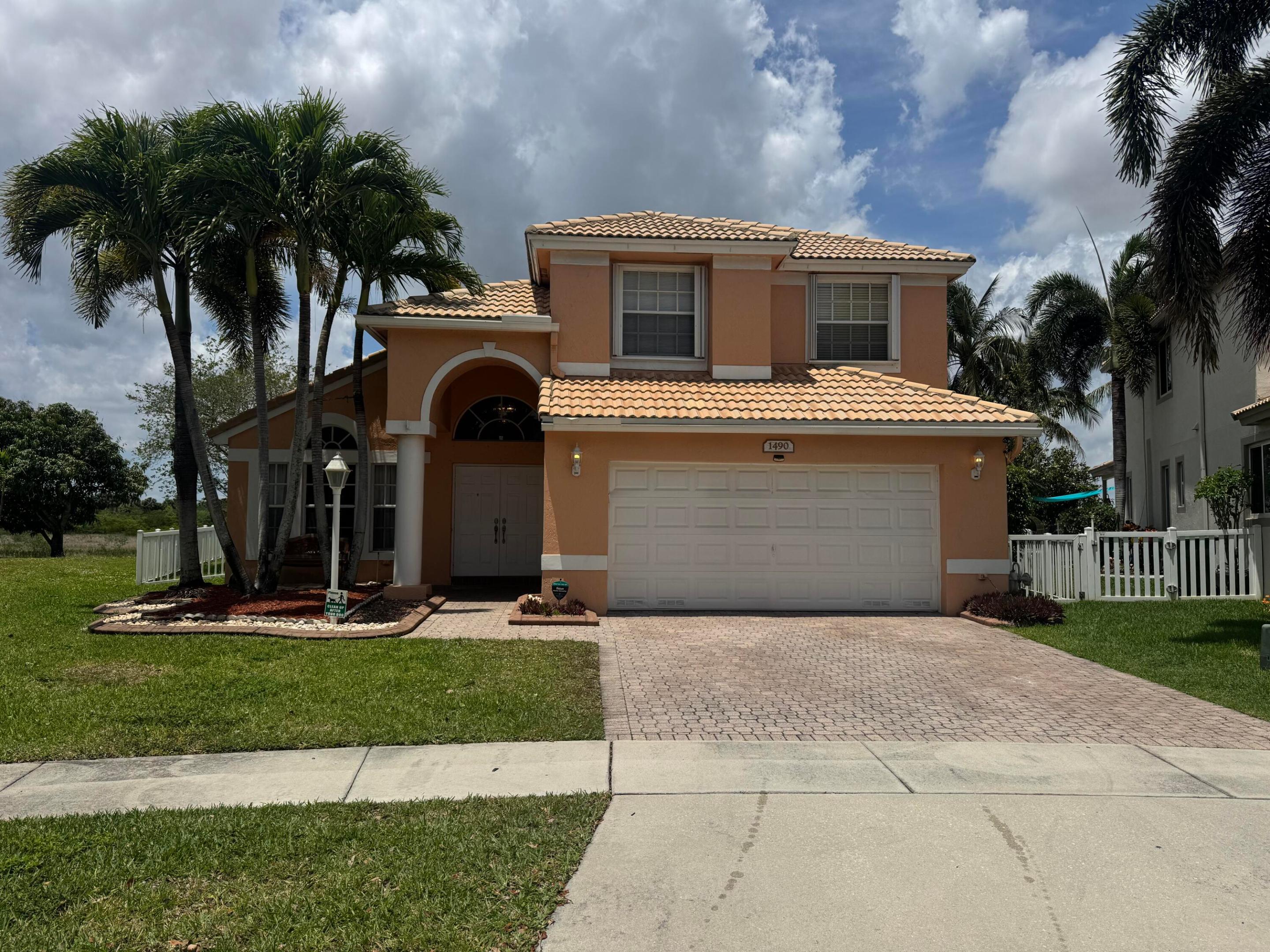 ....Price cut Super stylish house in Pembroke Falls is ready for your buyer. This gems as a great layout with split floor plan (master suite on 1st floor, 3 bedroom and 1 full bathroom on 2nd floor, s/s appliances, and updated A/C  (2025). Large size lot (12200 ft). with open pool area and spa. Overview beautiful sunset lake.  This hidden gem gives you the allusion of being on your private oasis. 24/7 guard gated security service.