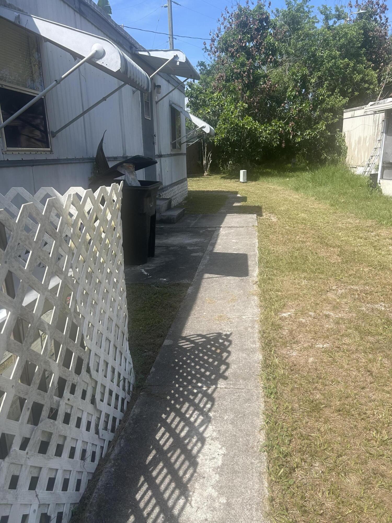 Welcome to this practical two-bedroom, two-bathroom ALL AGE mobile home located in Maravilla Gardens. This single-story residence offers straightforward living with dedicated spaces for rest and refreshment. The property provides the essentials for comfortable daily living in an established community setting. Consider this home as a solid foundation for your next chapter in Fort Pierce.