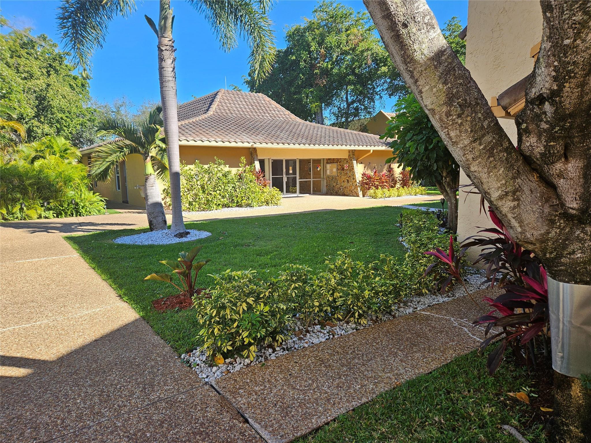I am pleased to present a stunning corner unit condo, ready for immediate move-in.This fully furnished condo features 2 bedrooms and 2 bathrooms and has been substantially remodeled, including a new kitchen and new vanities in both bathrooms. Additional features include ceramic floors throughout, high-impact windows, and an accordion shutter on the porch.The property is located in a quiet, very well-maintained community. Its location offers: - Proximity to all major highways (US1, I-95, Sawgrass)  - Approximately 1.5 miles from the beach  - Walking distance to all shopping centers  - Easy access to all modes of transportationPlease let me know if you would like to schedule a viewing or require any further details.
