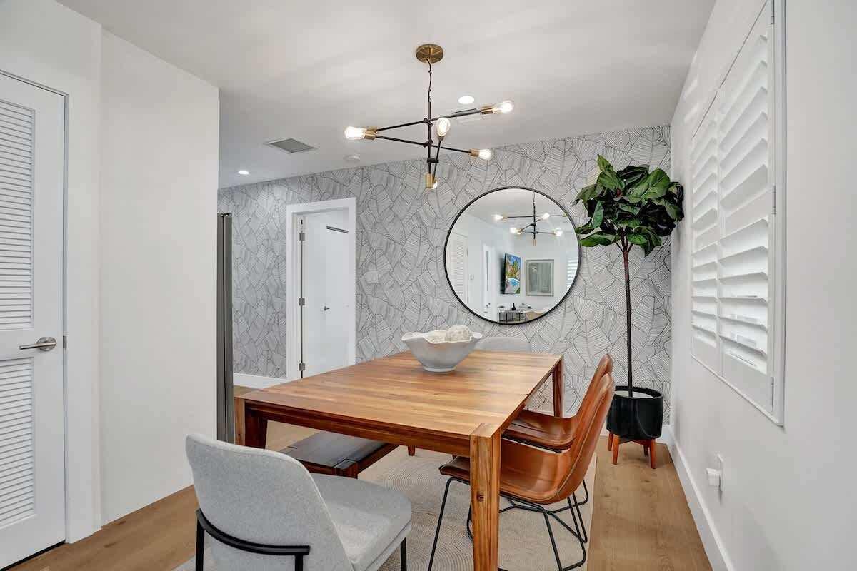 Turnkey duplex opportunity one block north of Victoria Park in Lake Ridge. This impeccably maintained property features one spacious 2 BD/2BR & one large 1BD/1BR generating over $130,000 gross income(2025). Located on a quiet tree-lined street just minutes from Las Olas, downtown Fort Lauderdale, beaches, shopping, and dining. Highlights include beautifully remodeled units, a brand-new pool, impact windows and doors, electric door locks, premium Weston Heavenly Beds, & strong short-term rental performance with professional management systems already in place.  Rare opportunity to purchase together with neighboring 1039 N Victoria Park Rd, a triplex consisting of one 2BD/1BA & two 1BR/1BA units generating approximately $132,600 annually, creating a premier income-producing compound.